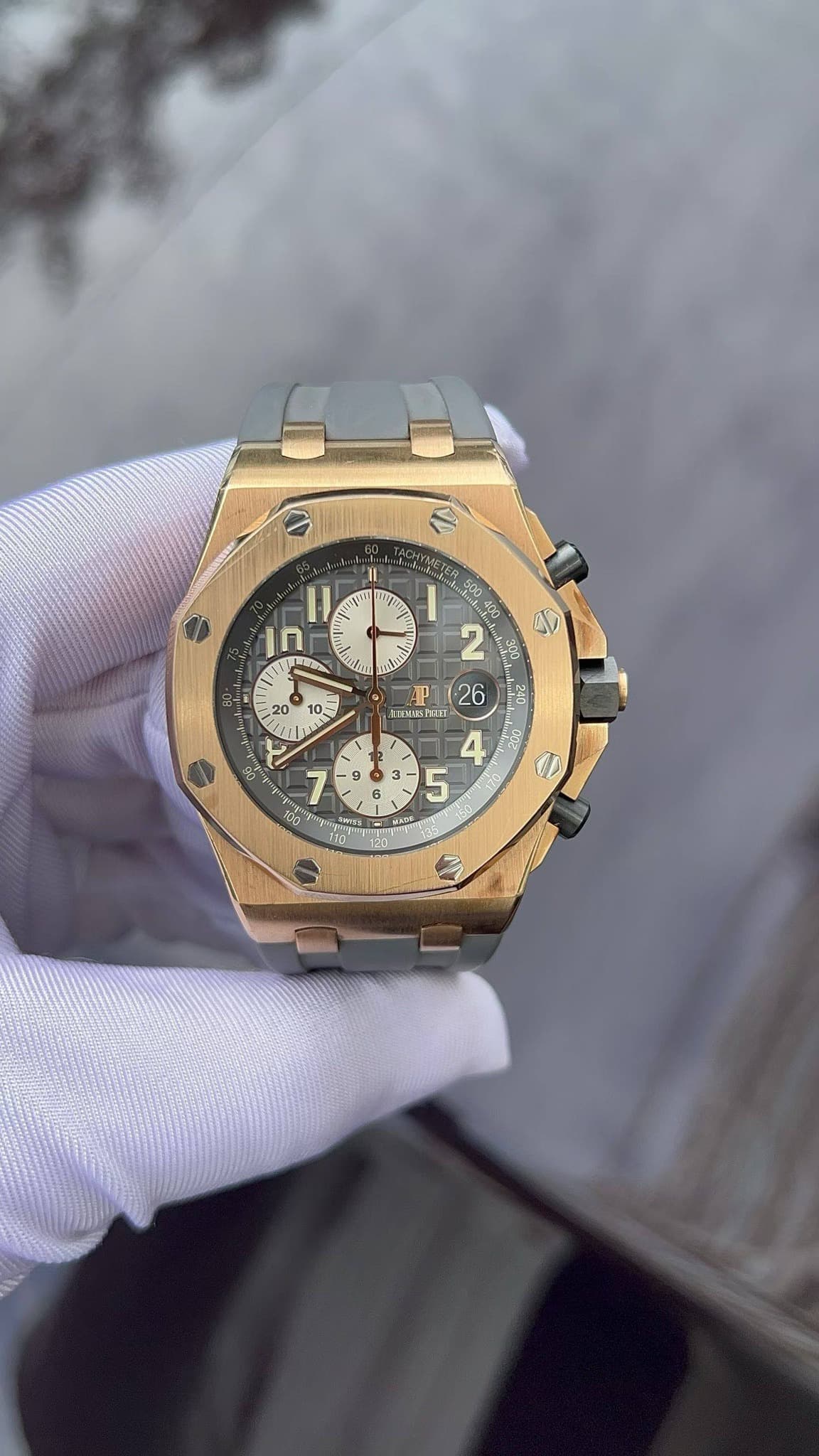 May be an image of wrist watch and text
