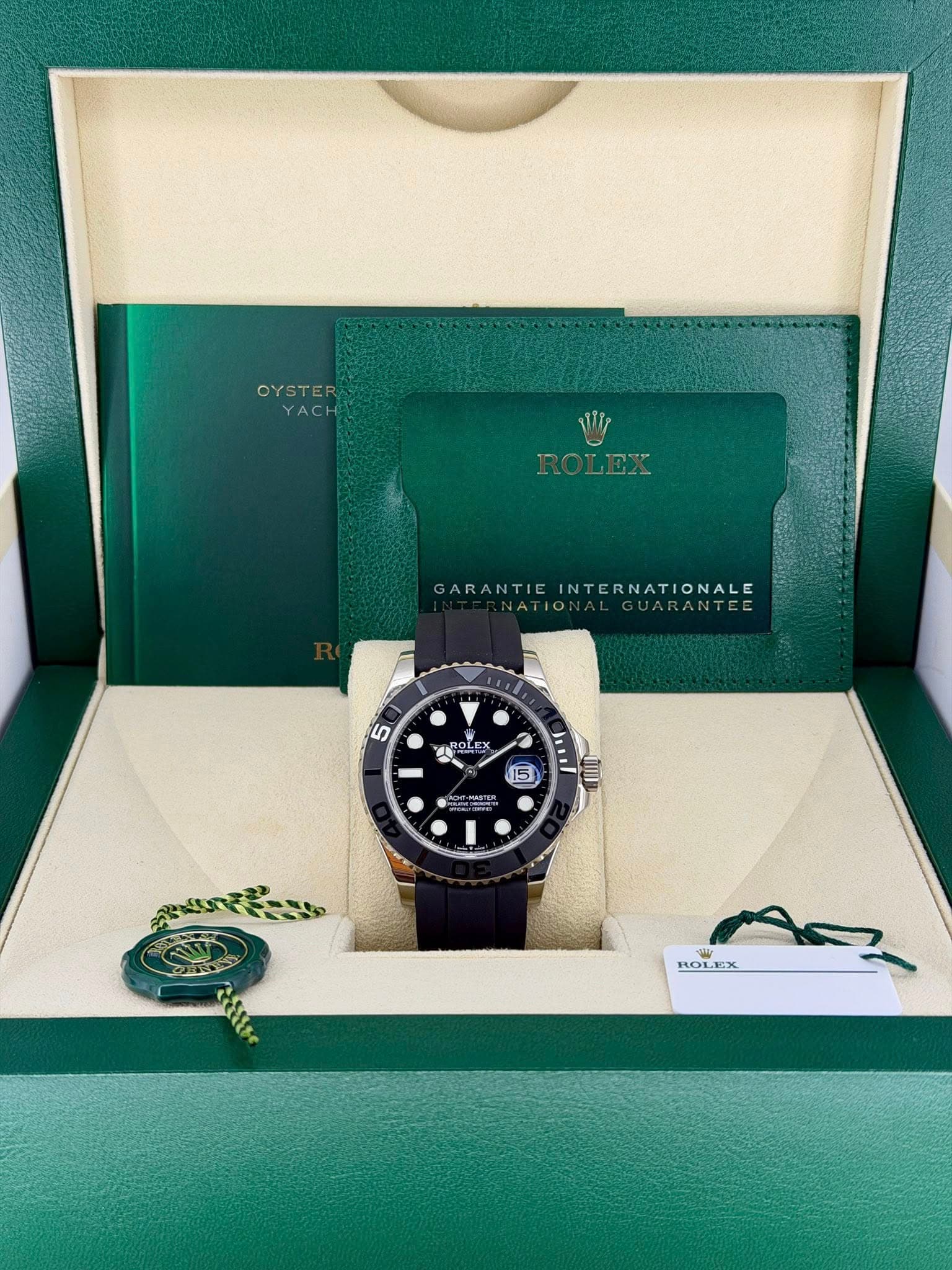 May be an image of wrist watch and text that says 'OYSTER OYSTER YACH WIp ROLEX ROLEX GARANTIE ARANTIEINTERNATIONALE INTERNATIONALE ATIO: or GUARANTEE 5 TiOk TROLEX LEX 15…