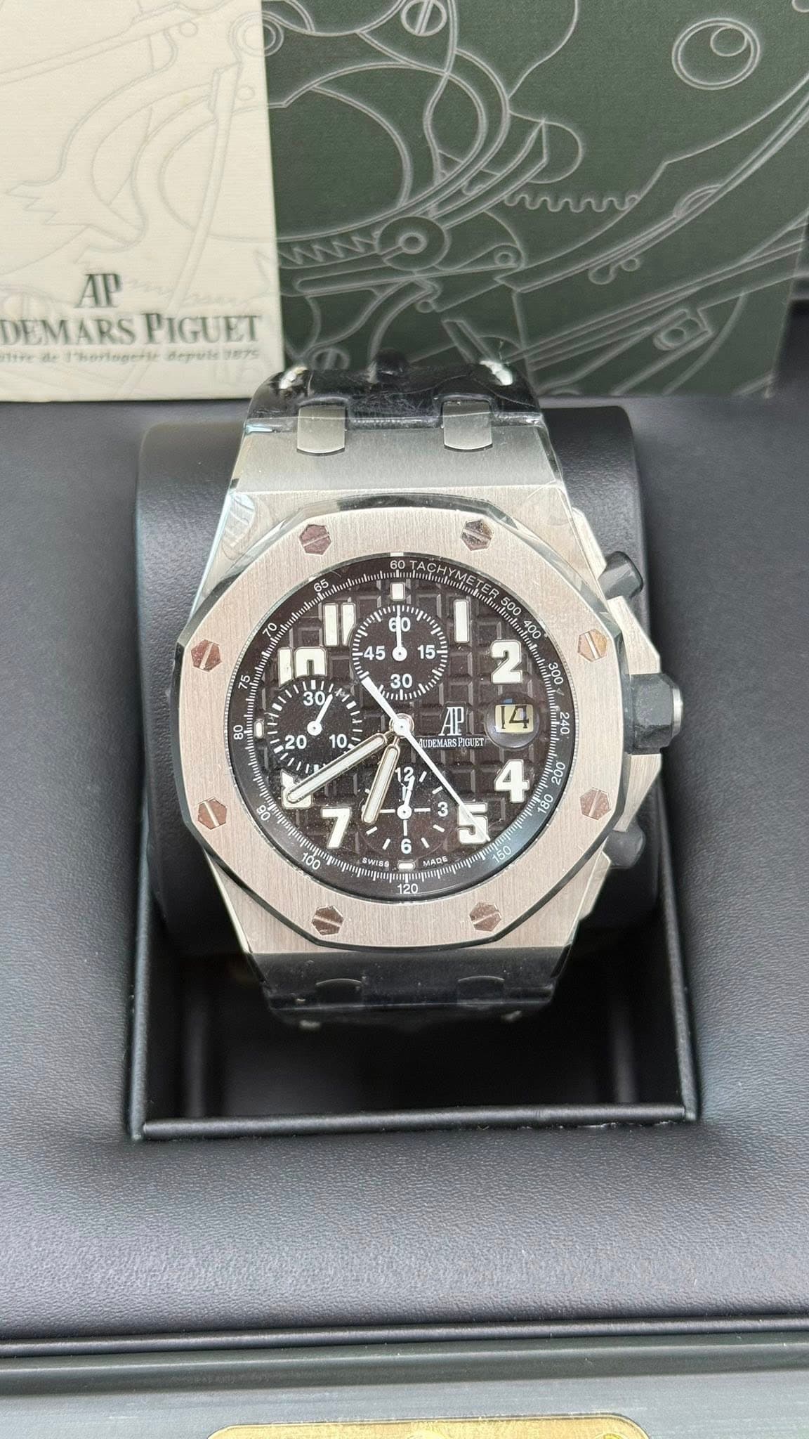 May be an image of wrist watch and text
