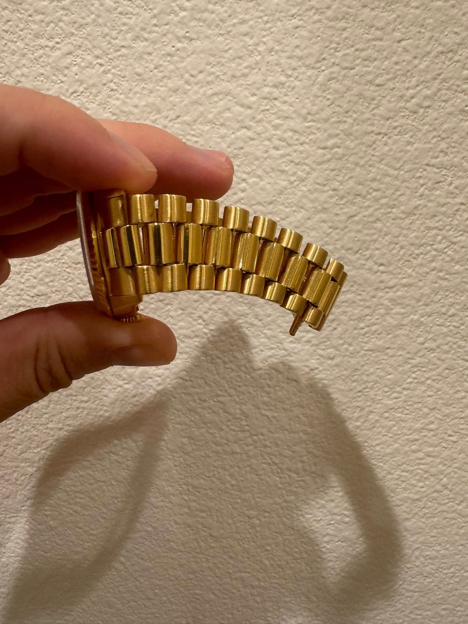 May be an image of wrist watch