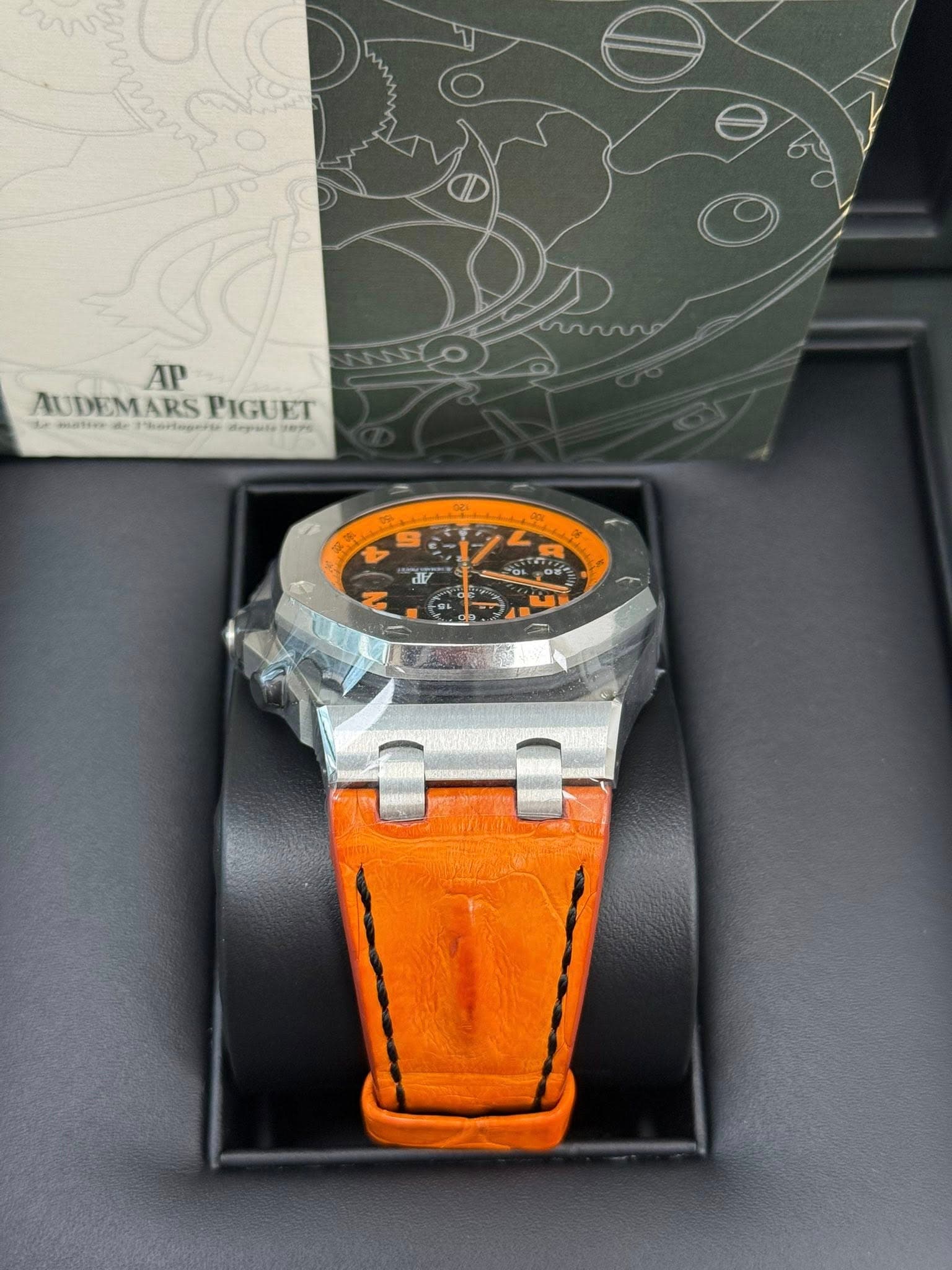 May be an image of wrist watch and text