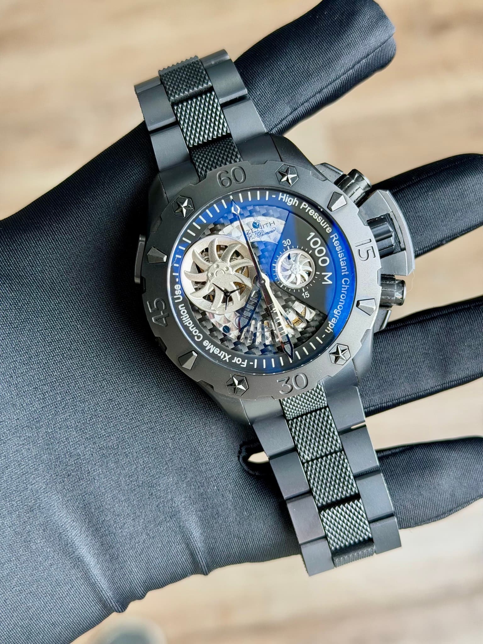 May be an image of wrist watch and text