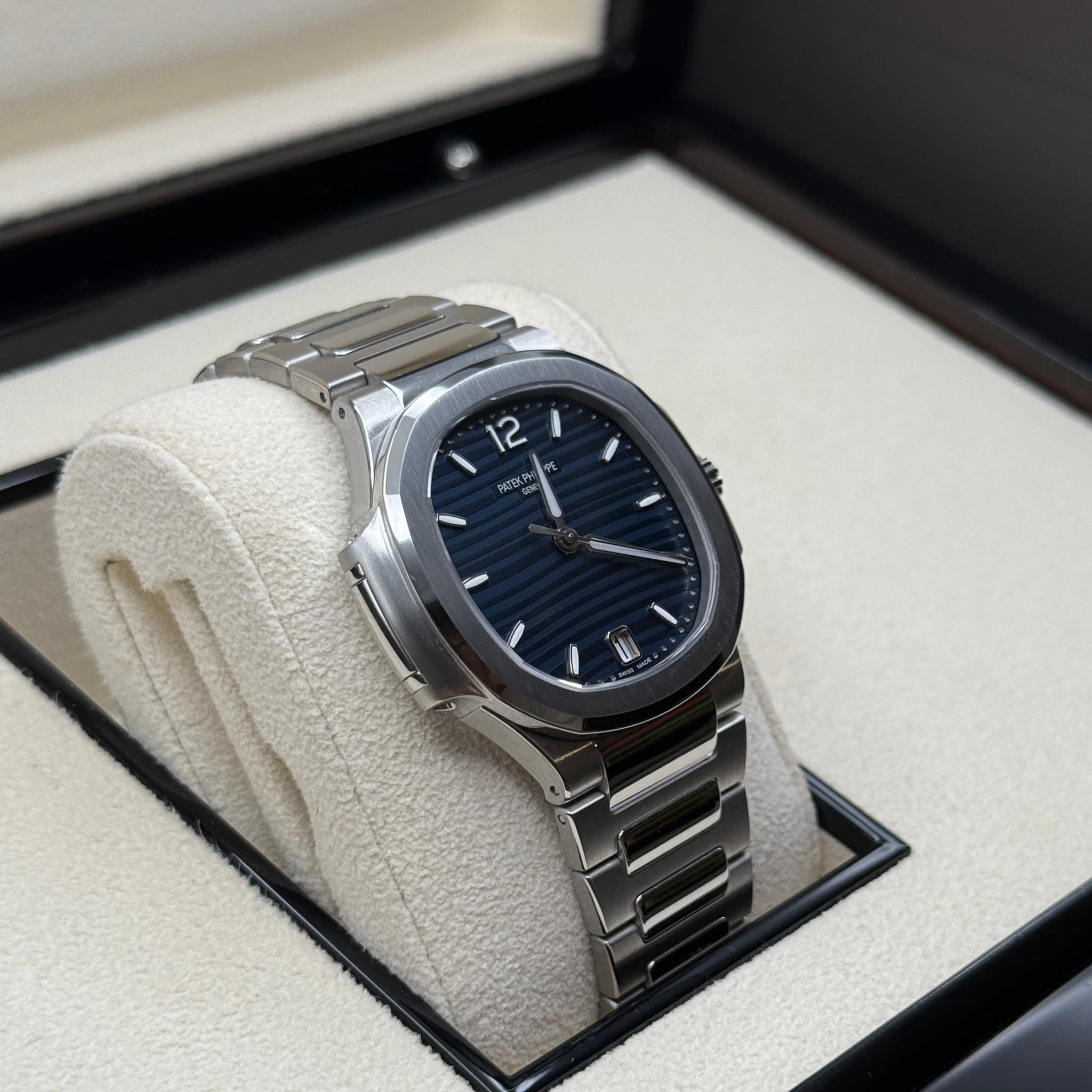 May be an image of wrist watch and text