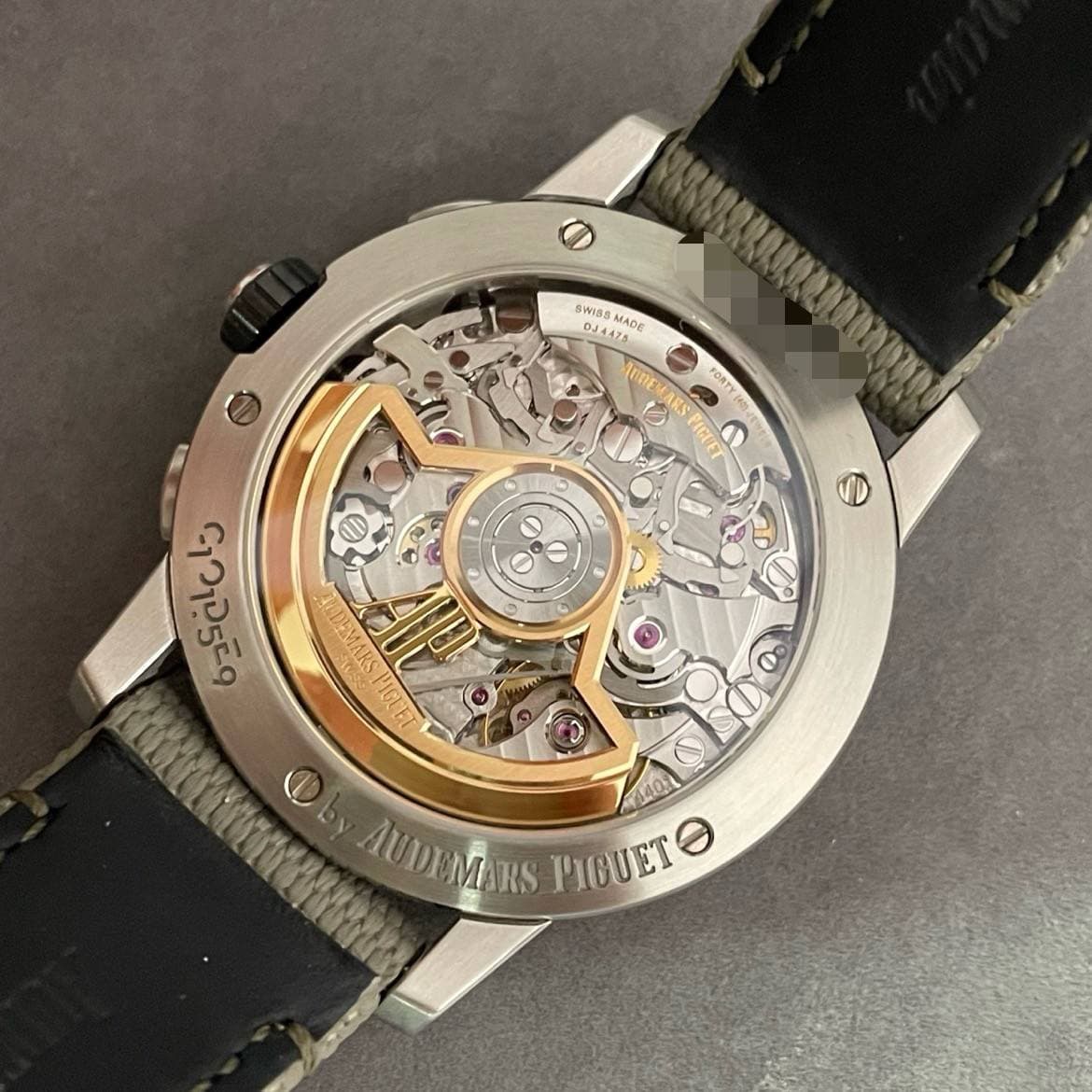 May be an image of wrist watch and text