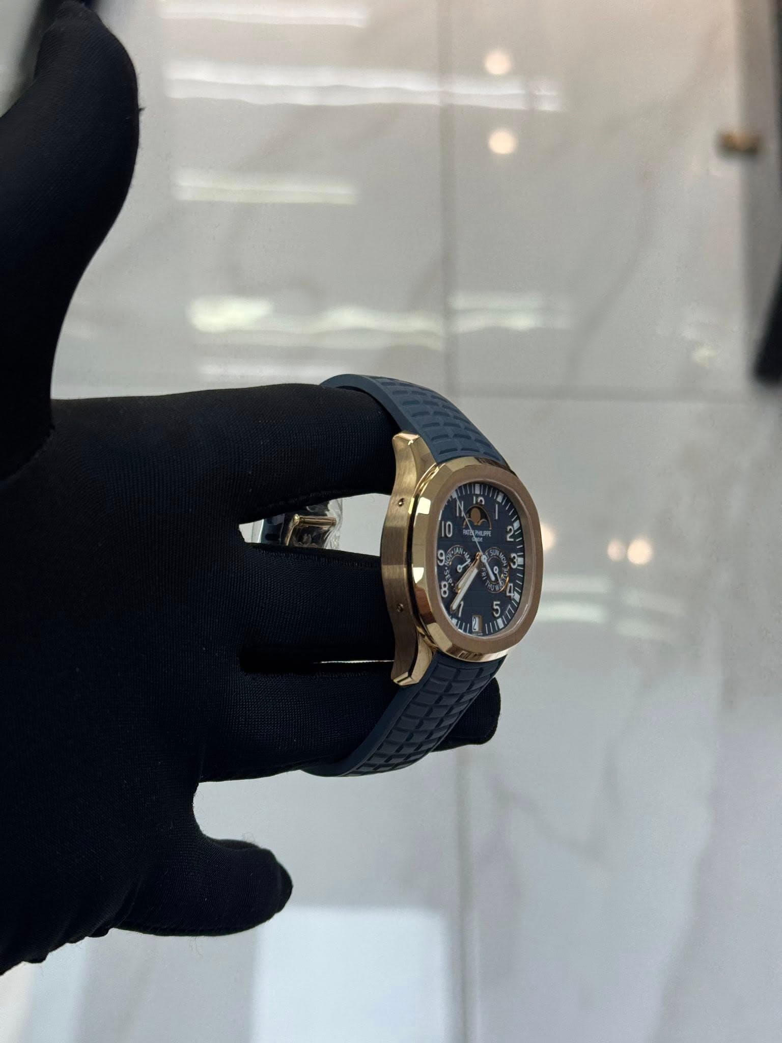 May be an image of wrist watch and text
