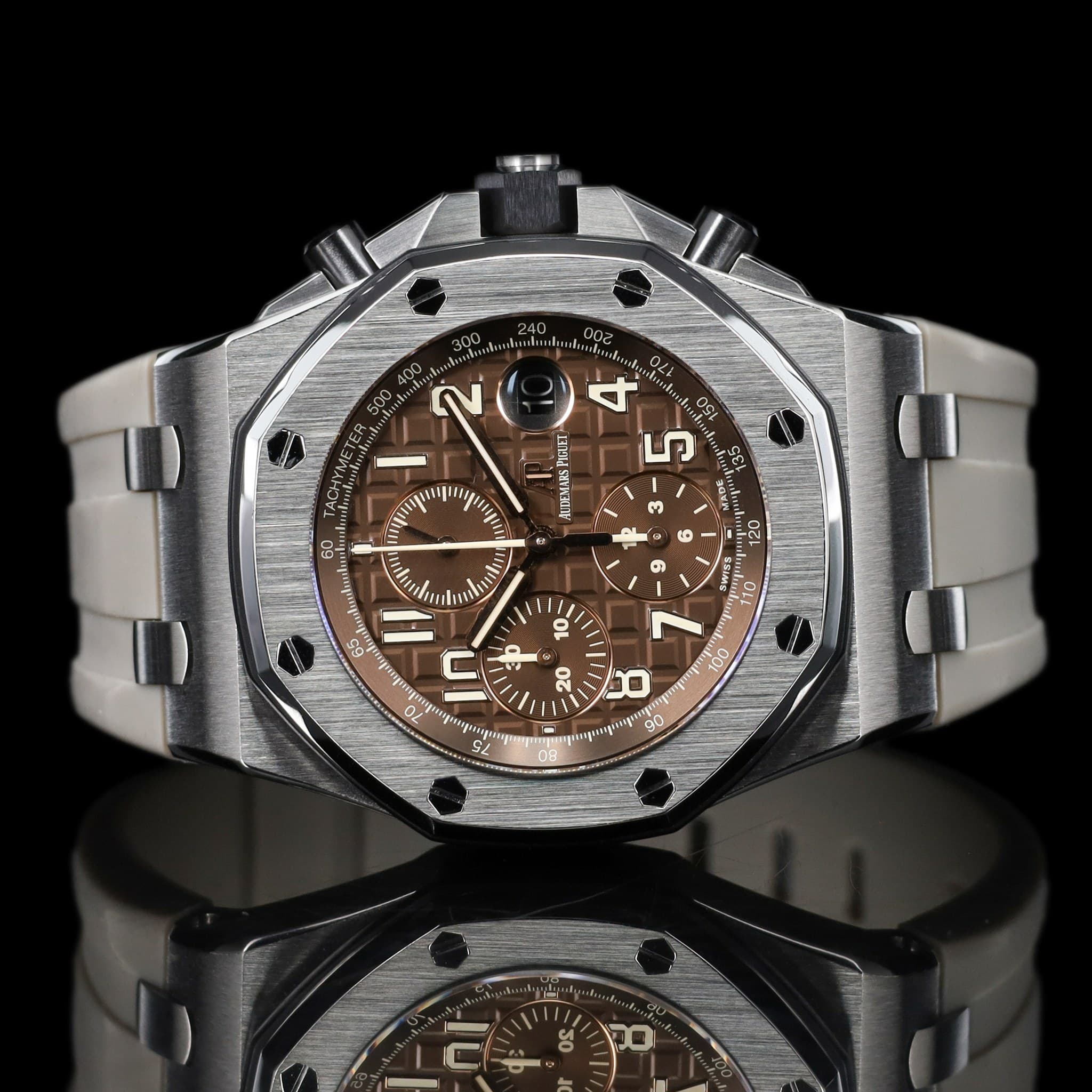 May be an image of wrist watch and text