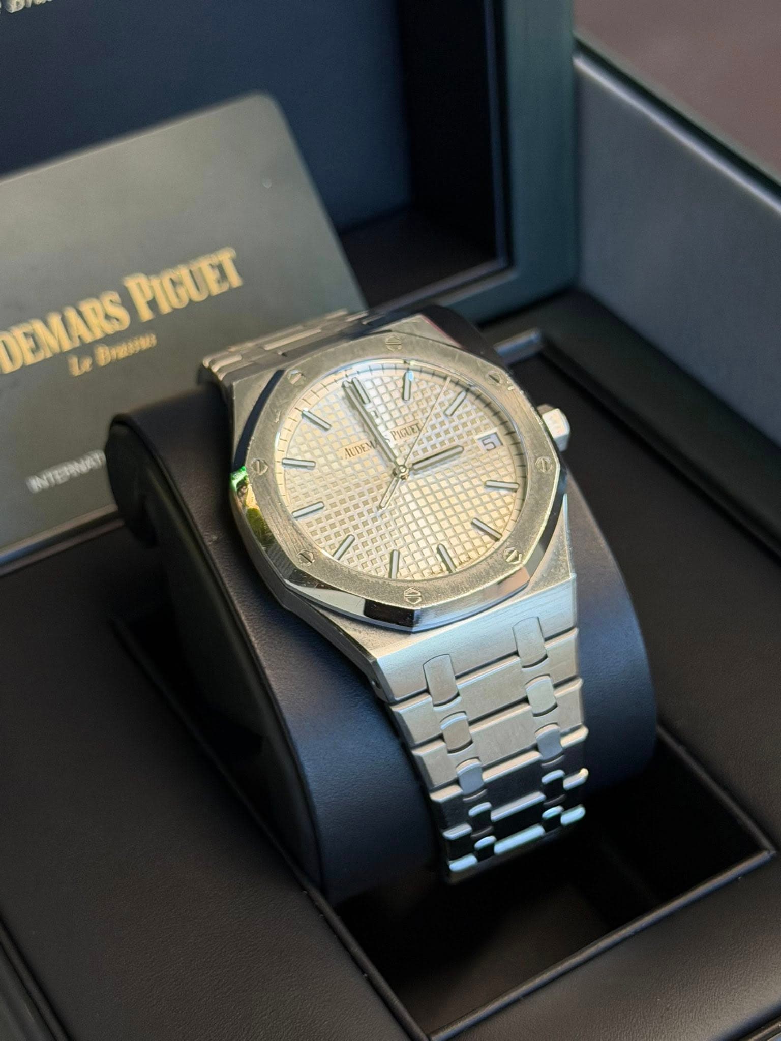 May be an image of wrist watch and text
