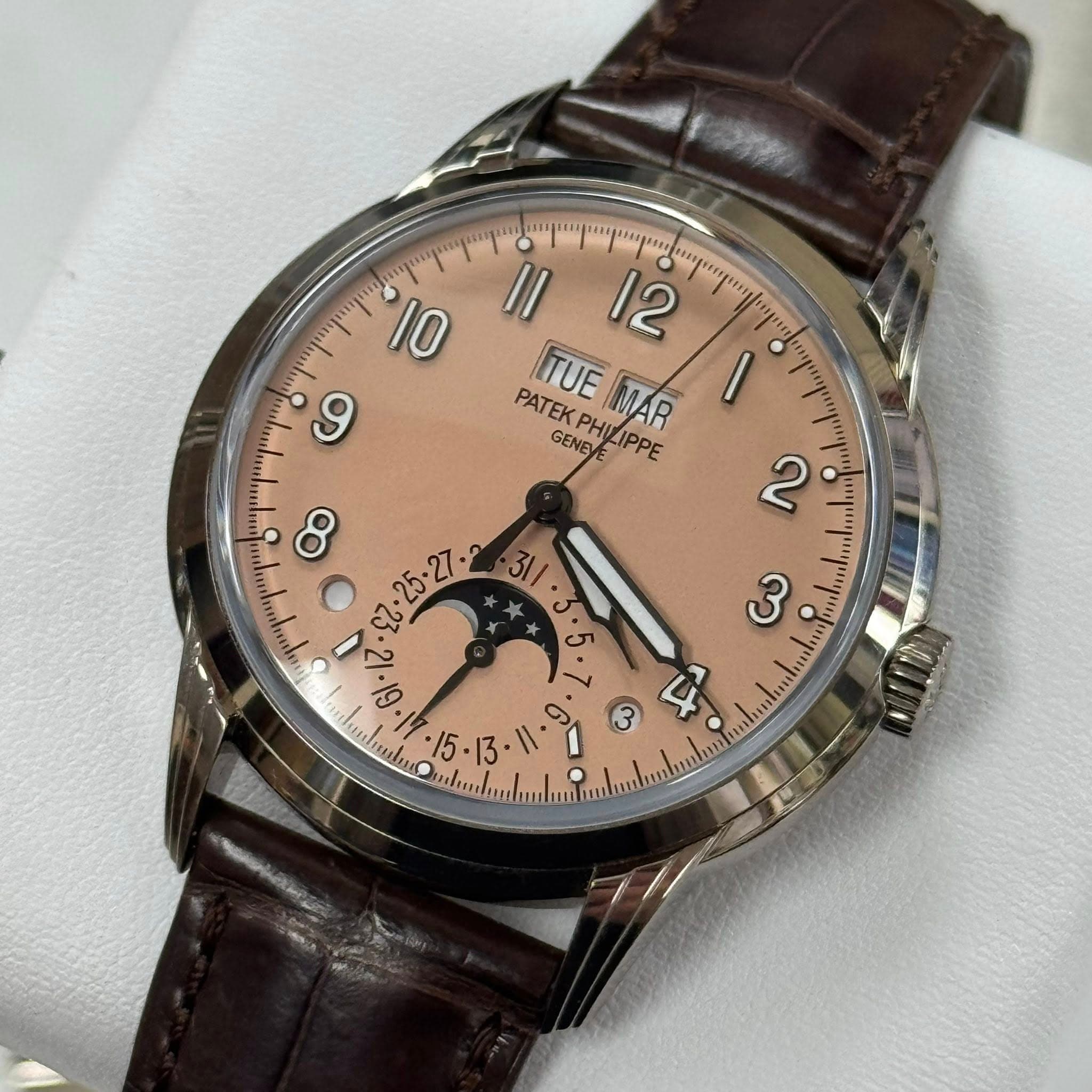 May be an image of wrist watch and text