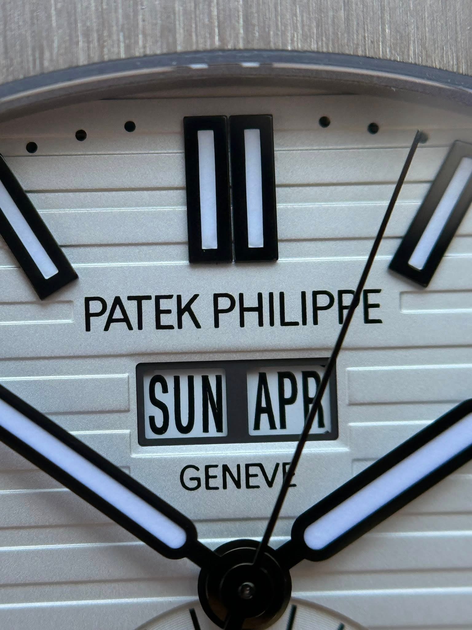 May be an image of wrist watch and text that says '|I PATEK PHILIPPE SUN APR GENEV'