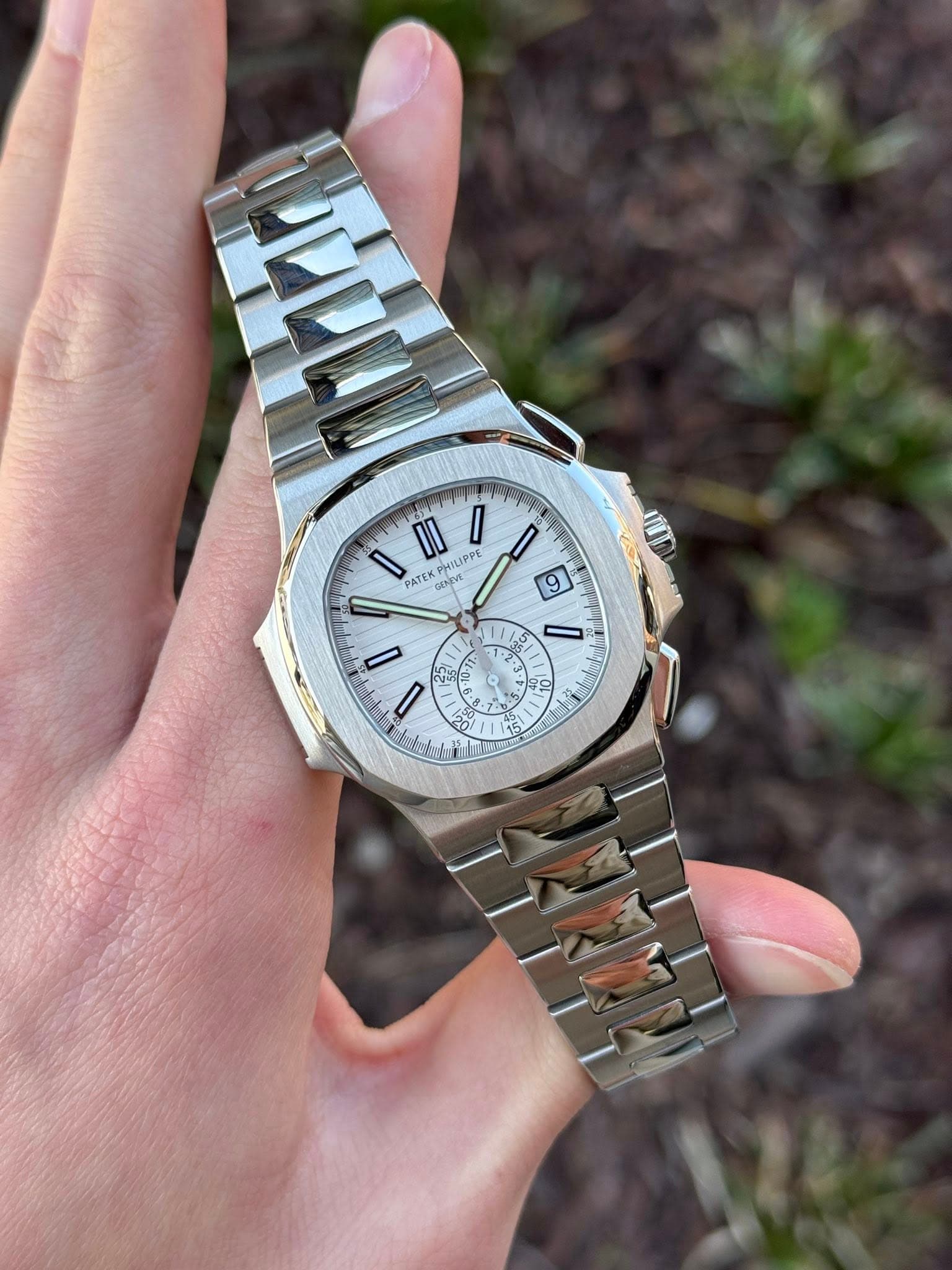 May be an image of wrist watch and text that says 'II I HILIPPE LIPPE PATE GENDE Mm 9 / - - Pay = S - M A '