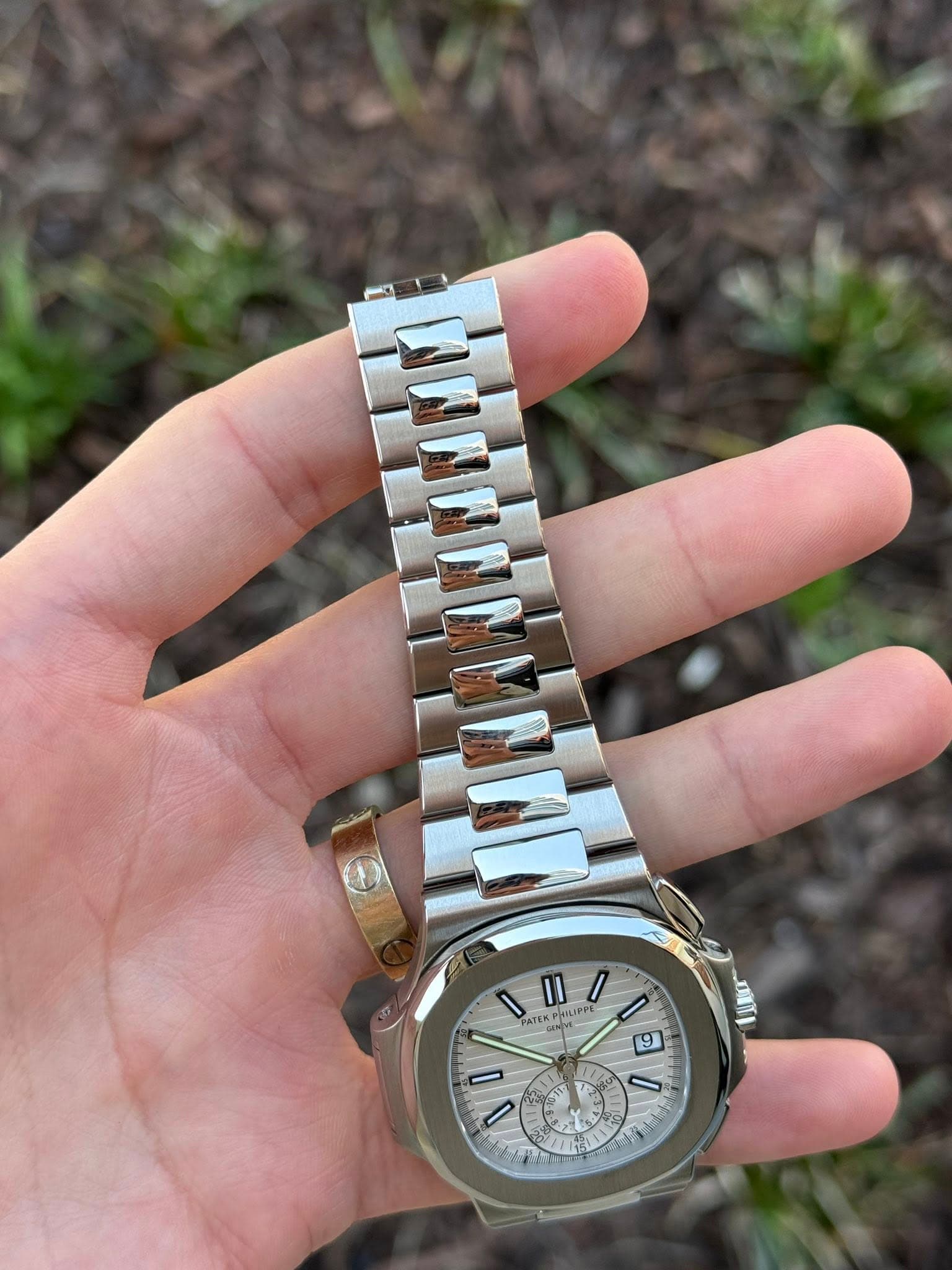 May be an image of wrist watch and text that says 'II PATEK PITLIP HILIPPI LIPPI PALPH 9 I M S ድሳ'