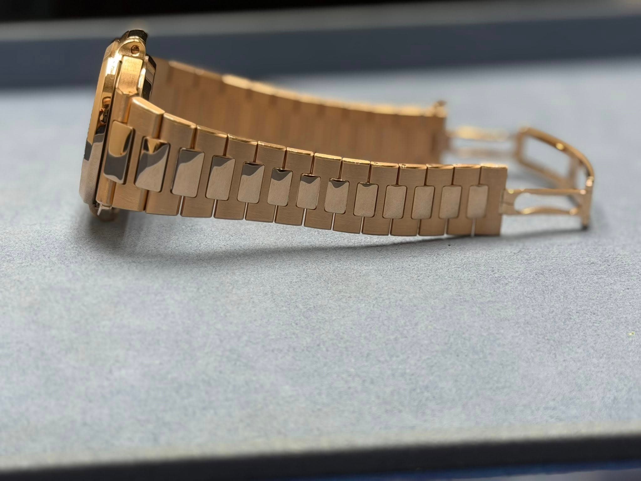 May be an image of wrist watch and jewelry
