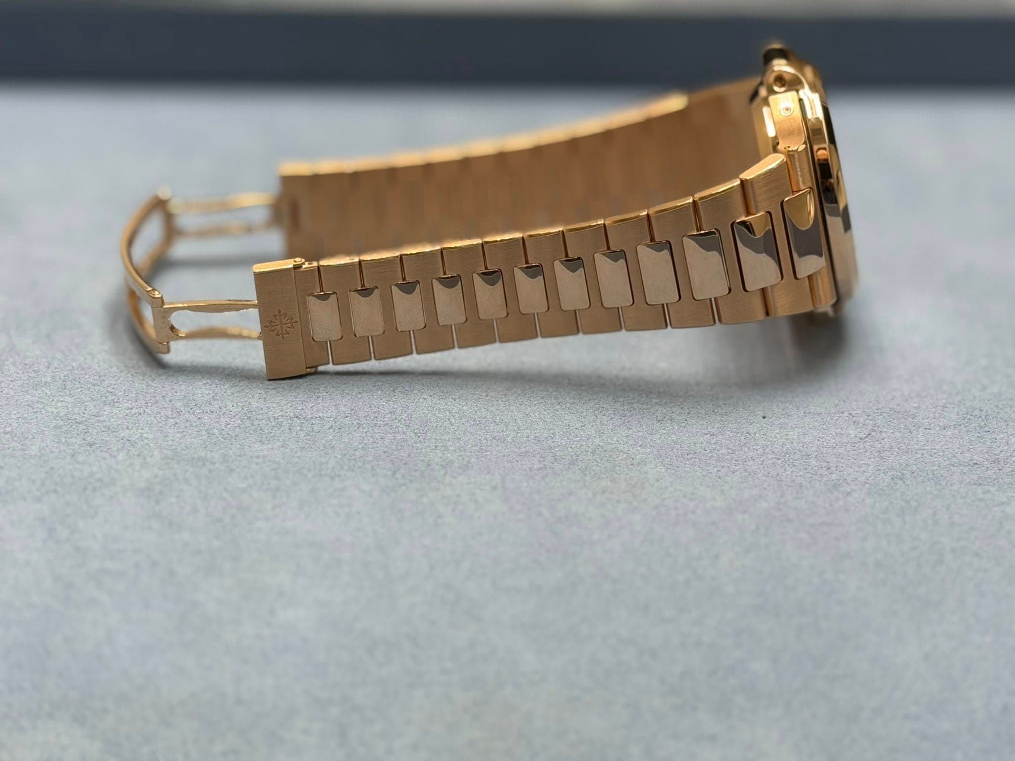 May be an image of jewelry and wrist watch
