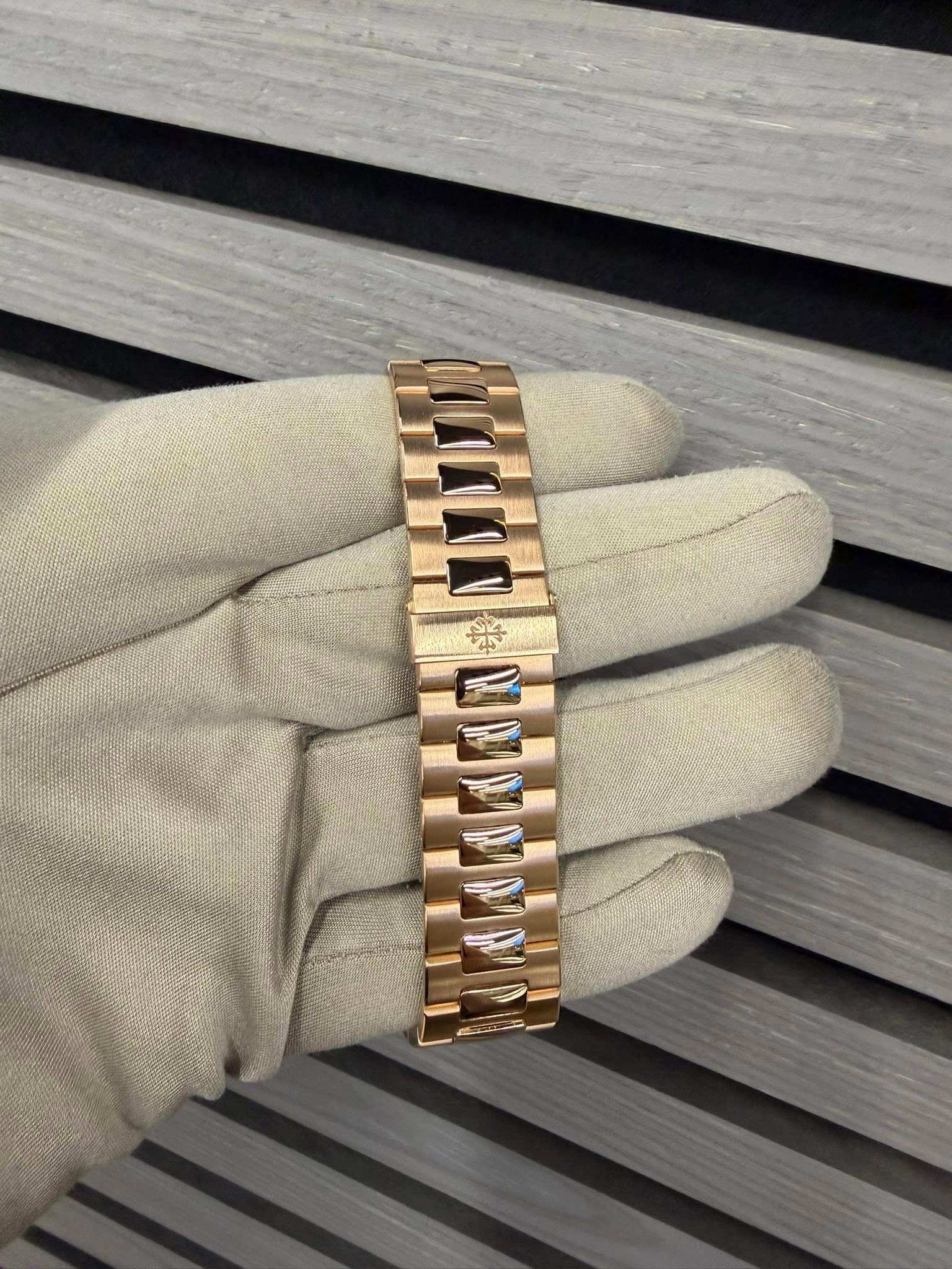 May be an image of wrist watch and jewelry