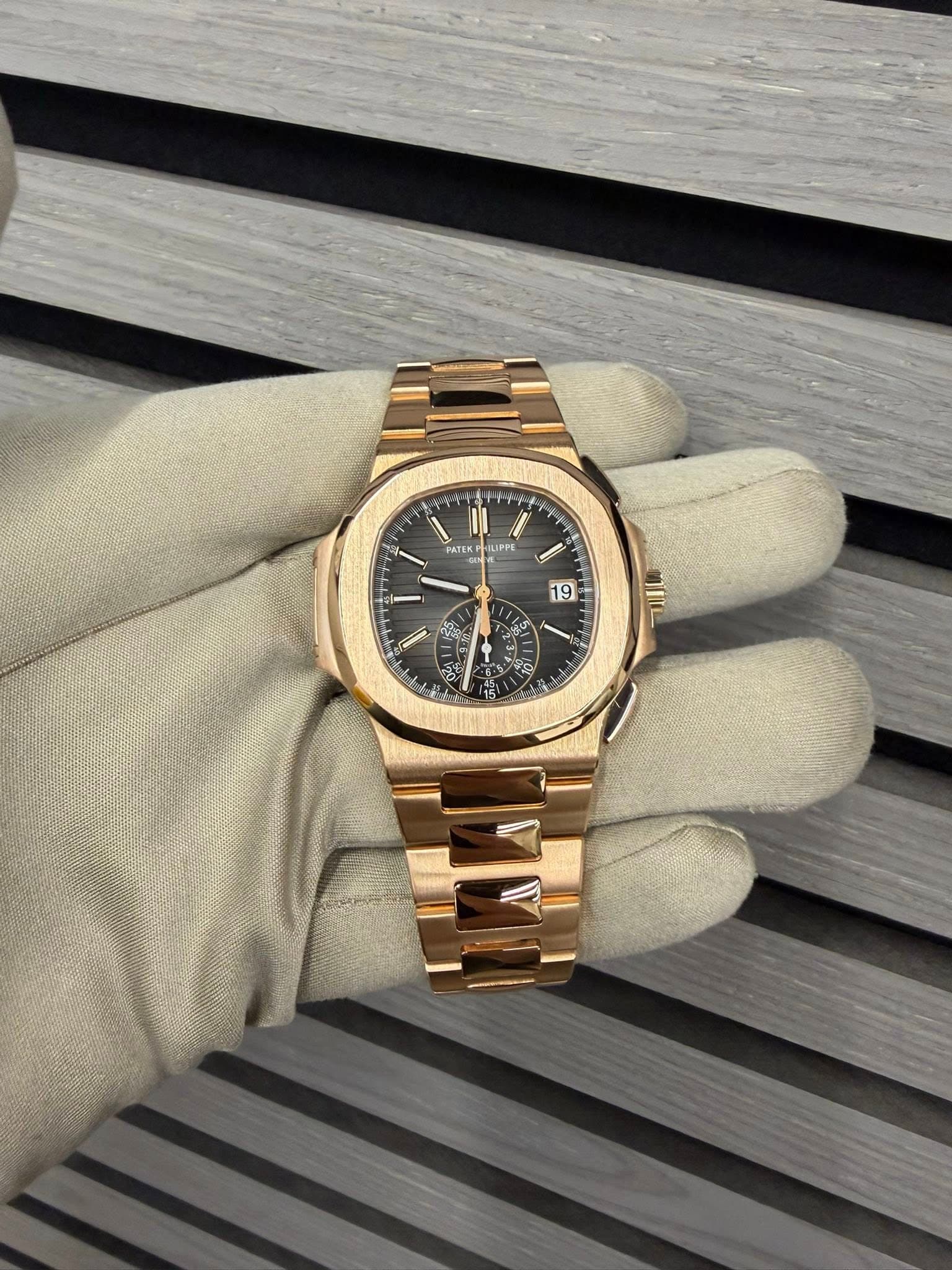 May be an image of wrist watch and text