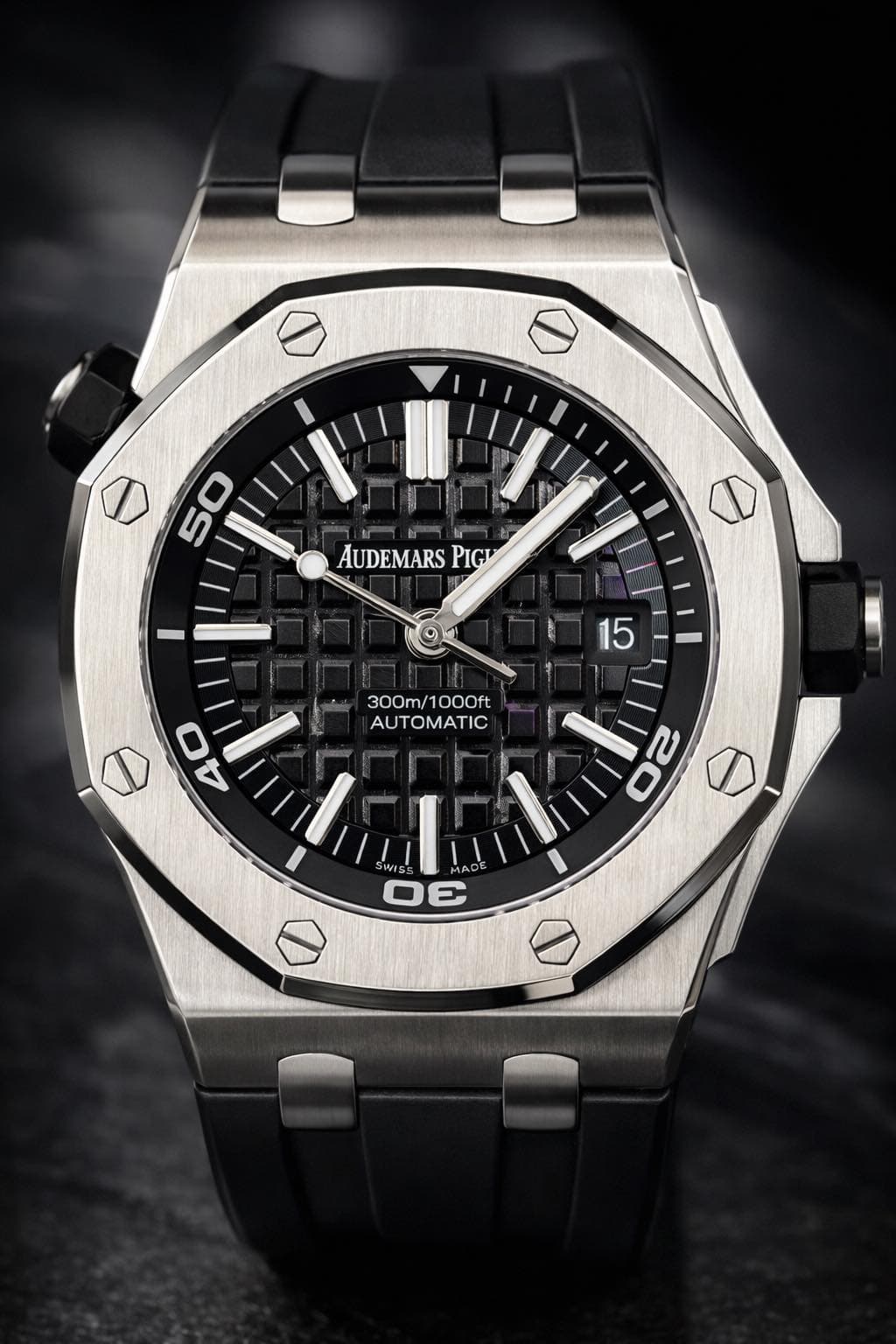 May be an image of wrist watch and text that says '50 AUDEMARS PIGI 15 300m/1000ft 300m 0 ot WISS S0 O0 4'