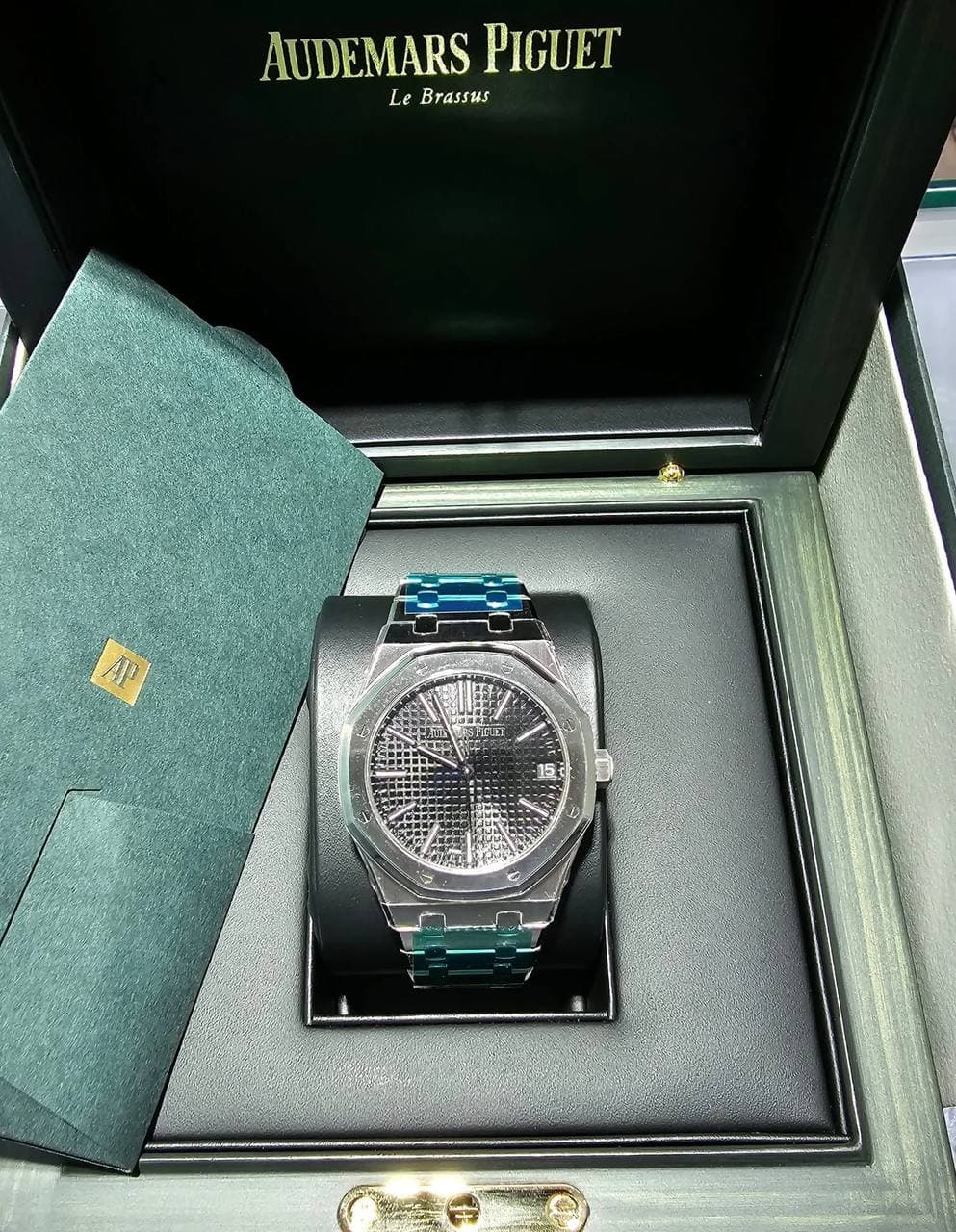 May be an image of wrist watch and text