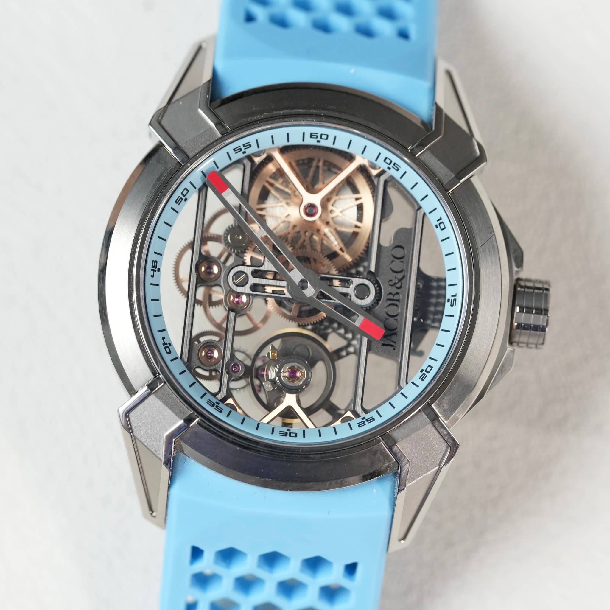 May be an image of wrist watch and text