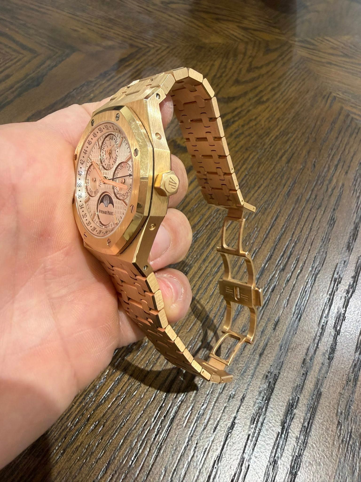 May be an image of wrist watch and text