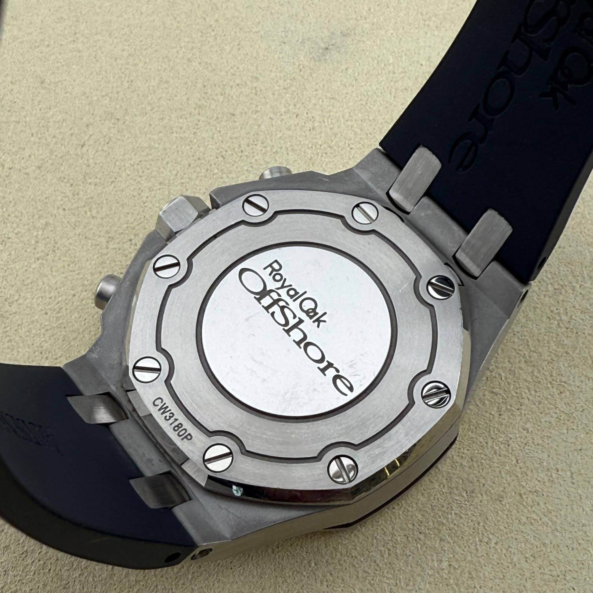 May be an image of wrist watch and text that says 'RovalOk OfShore Cak CW31 CW3180P CW3180P 80P O'