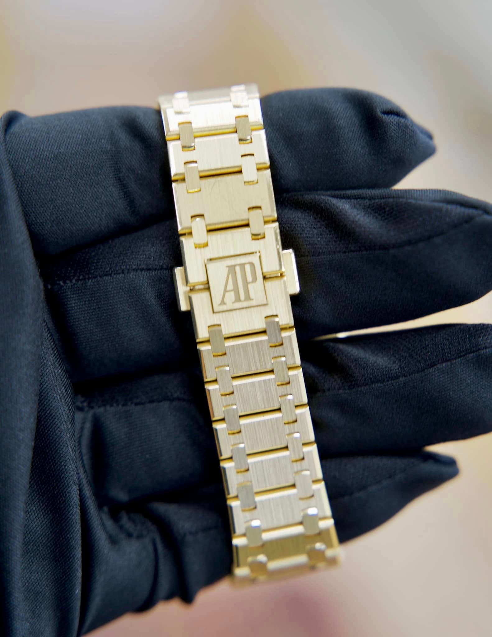 May be an image of wrist watch and text that says 'AP'