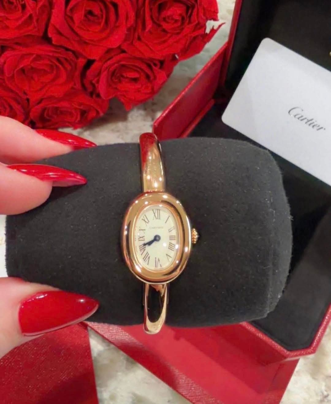 May be an image of wrist watch and text