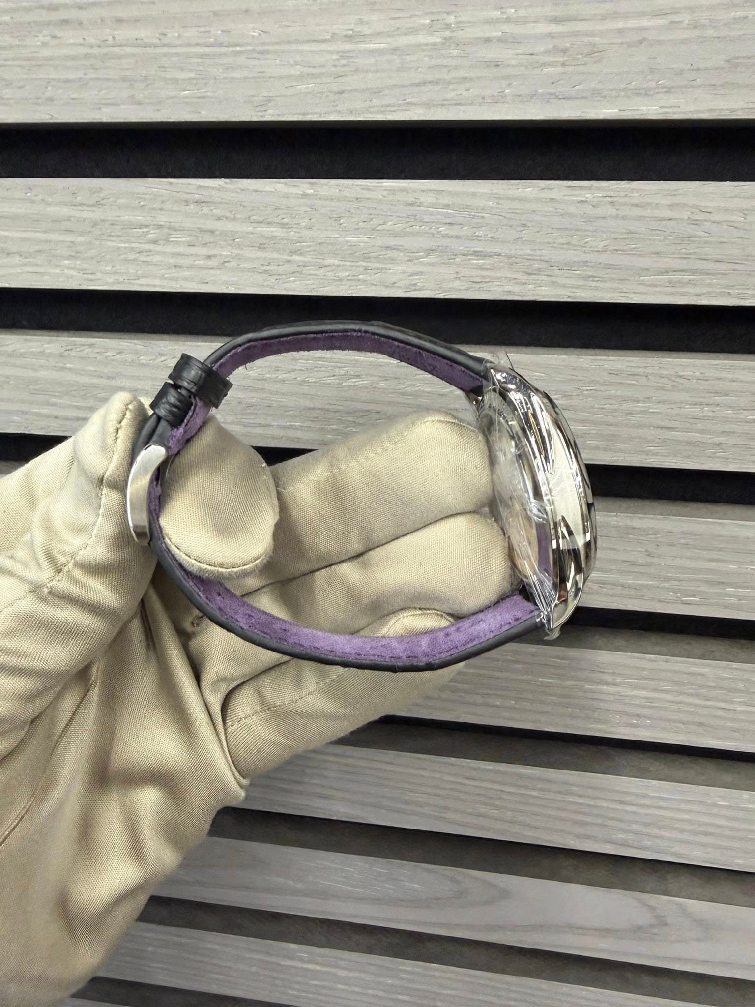May be an image of wrist watch and leather