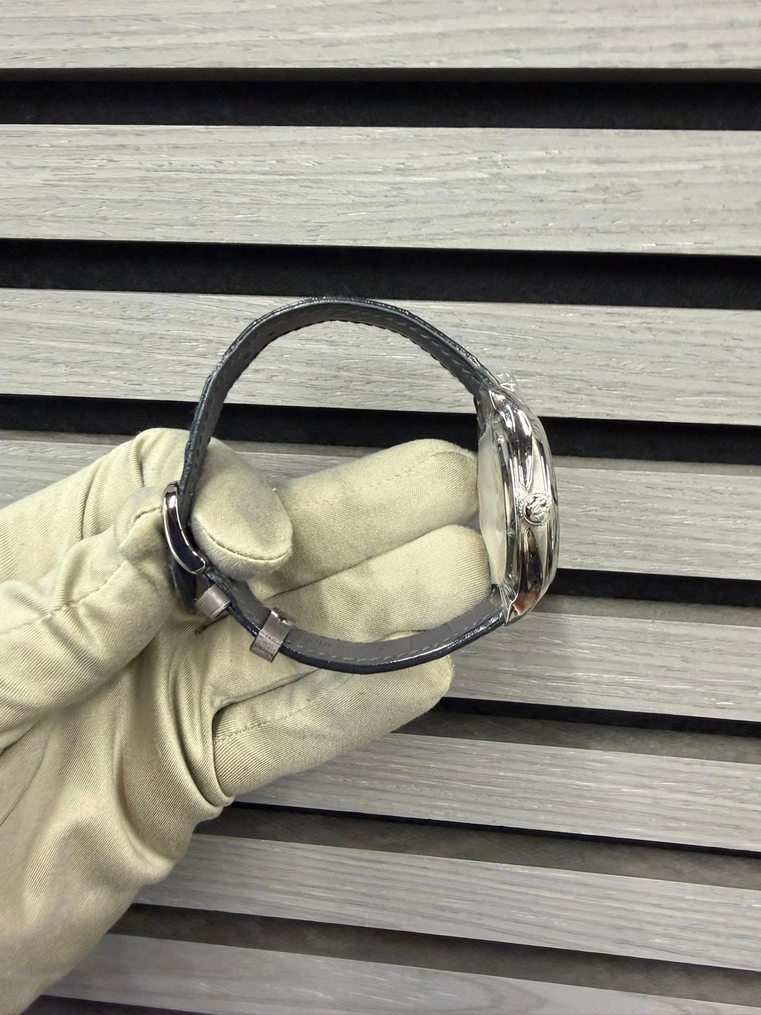 May be an image of wrist watch