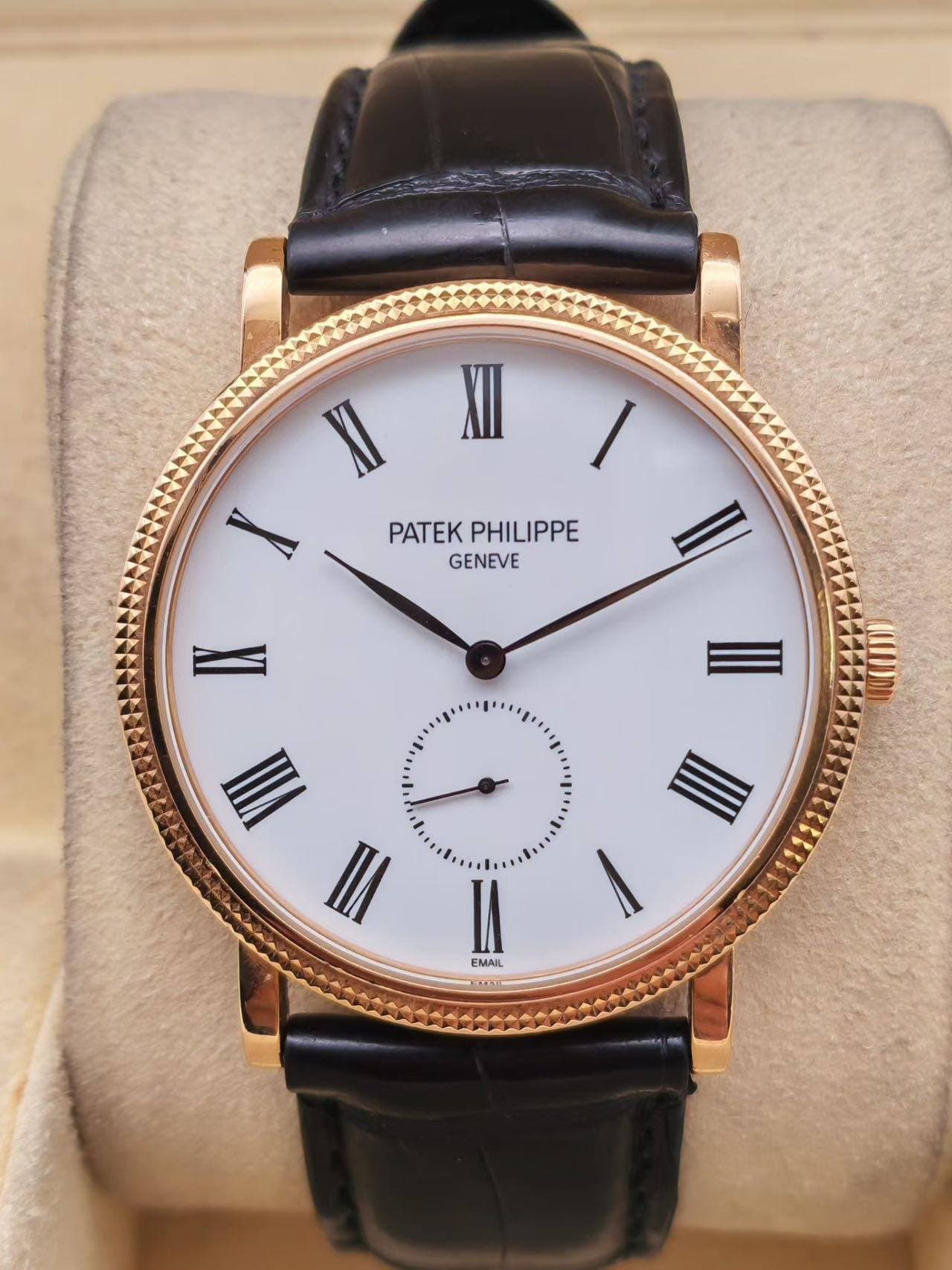 May be an image of wrist watch and text that says 'XII PATEK PHILIPPE GENEVE I ee I EMAIL I'