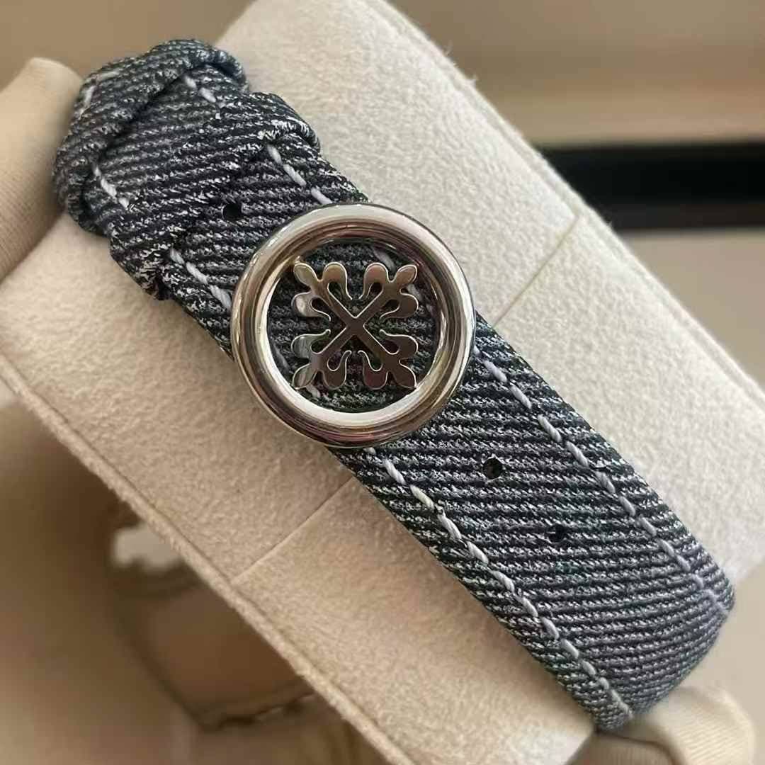 May be an image of wrist watch and jewelry