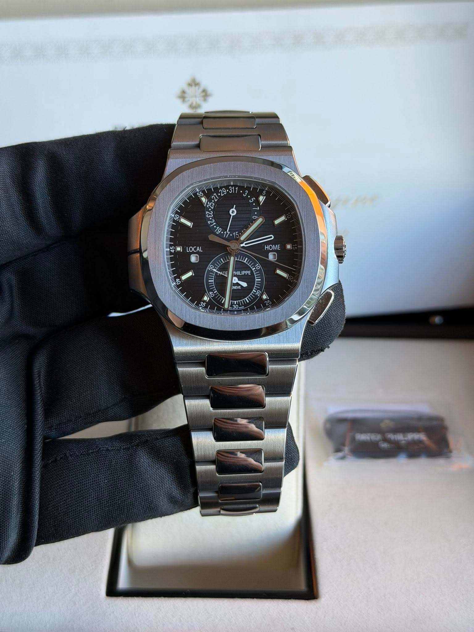 May be an image of wrist watch and text