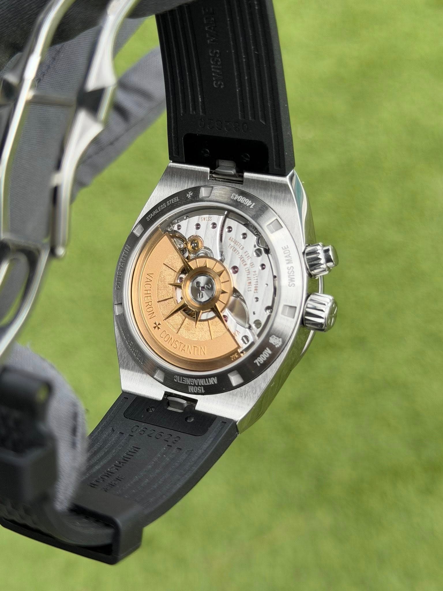 May be an image of wrist watch and text