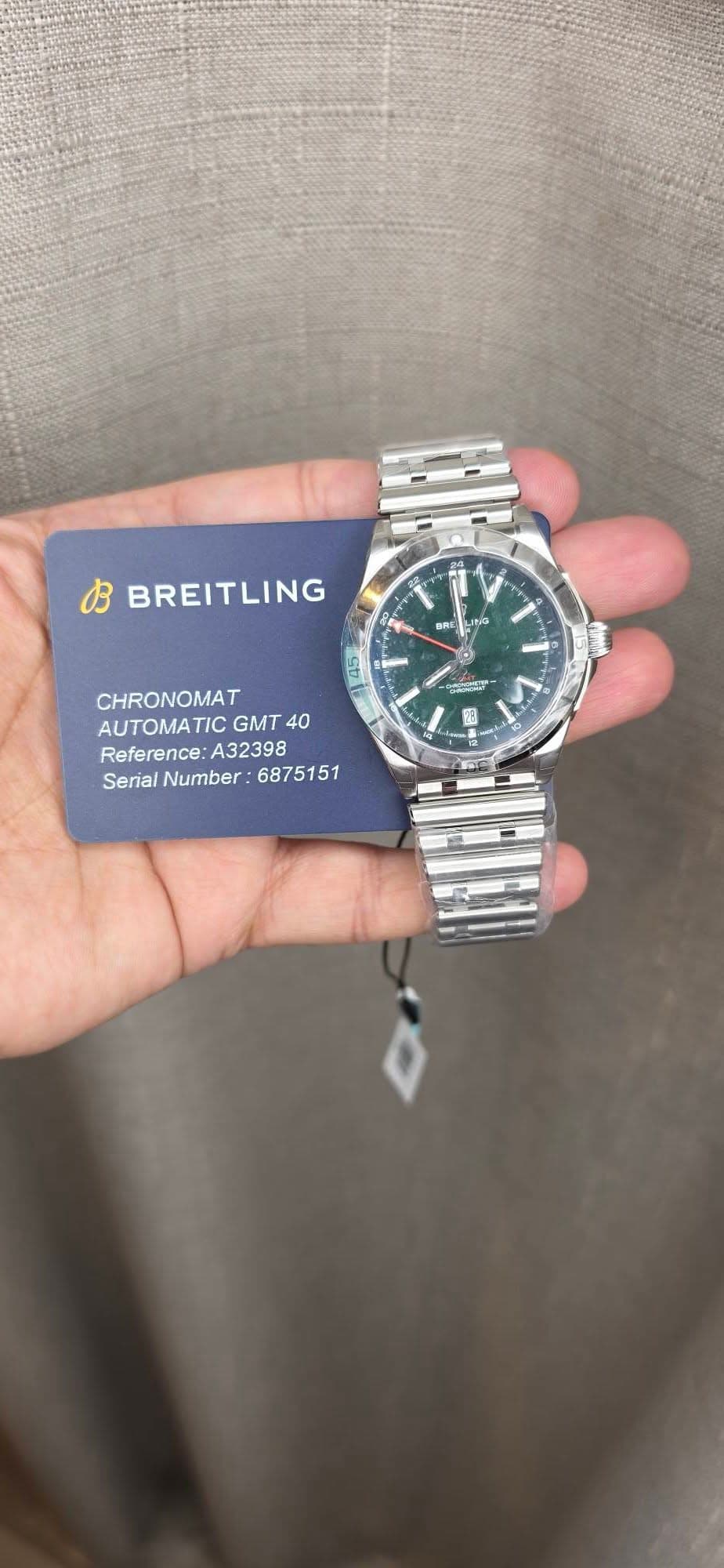 May be an image of digital watch and text that says 'BREITLING อหม LING 日日 CHRONOMAT AUTOMATICGMT4 AUTOMAT GMT 40 Reference:A32398 Reference: A32398 SerialNumber: Serial Number '