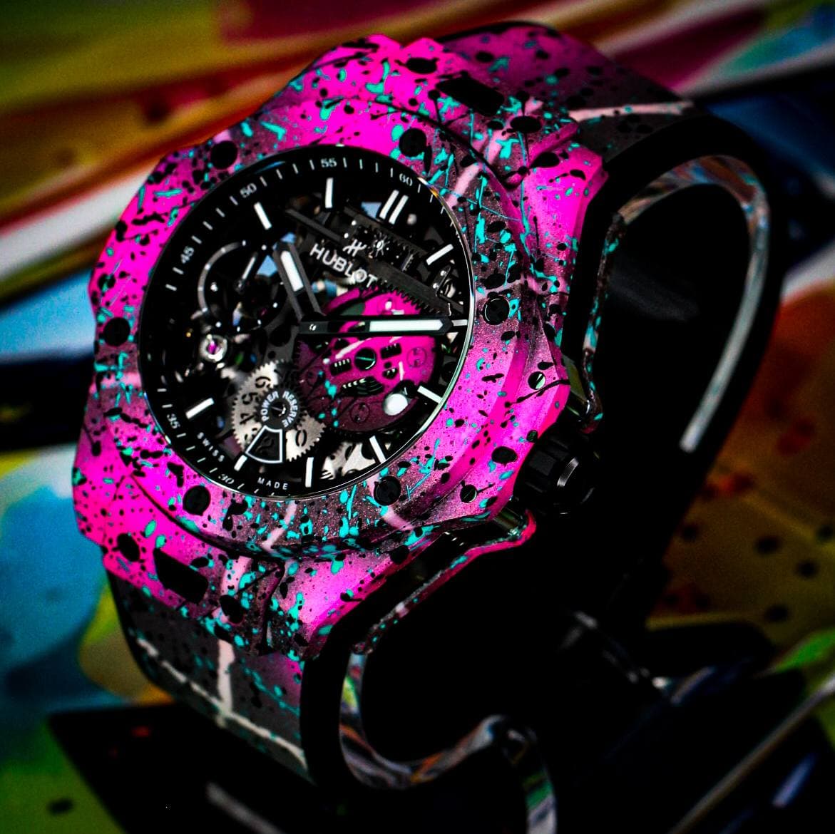 May be an image of digital watch and text that says '55 60 Il HUBLOT ٠ HUBLOT m OWER オマS'