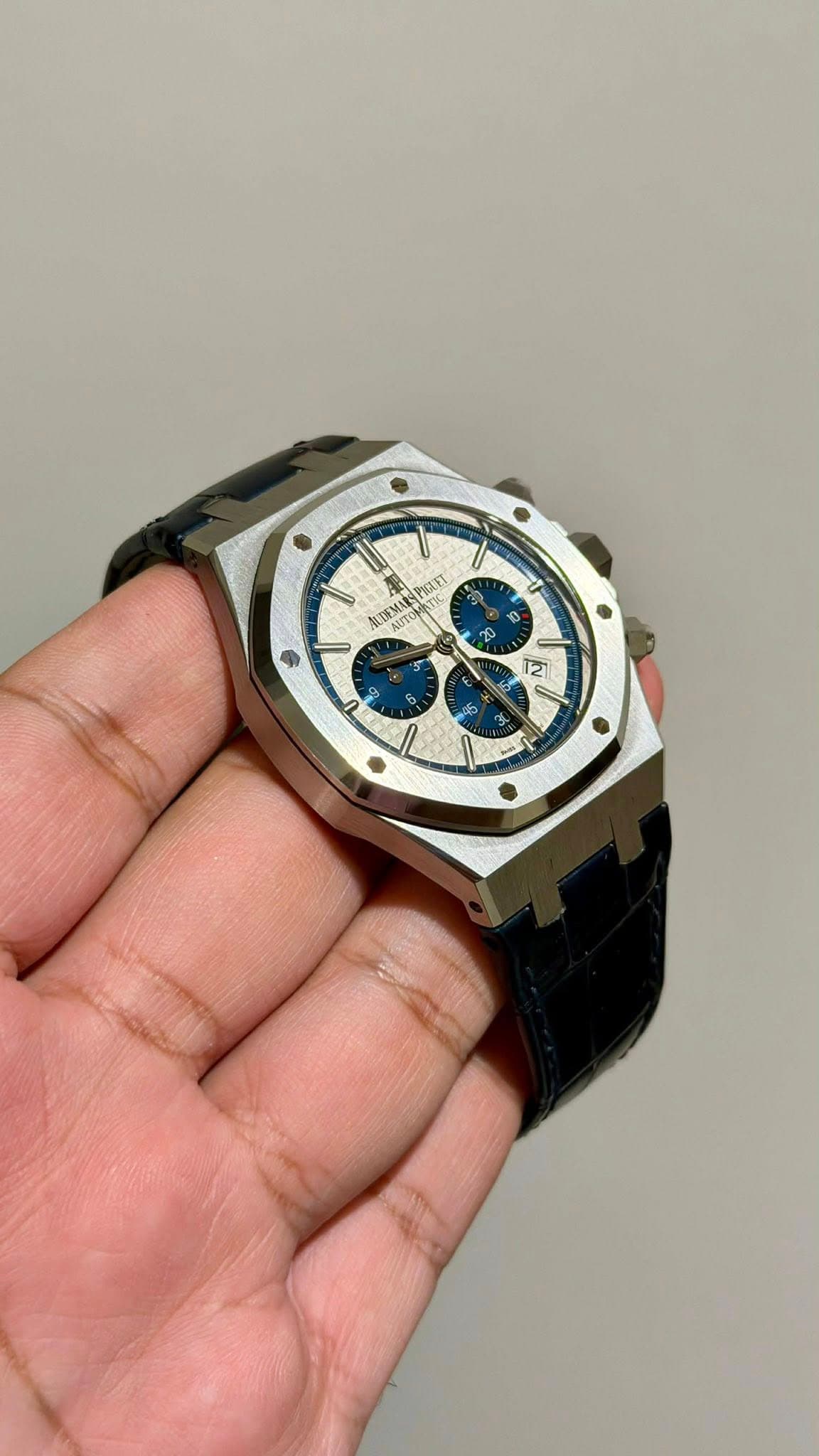 May be an image of digital watch and text