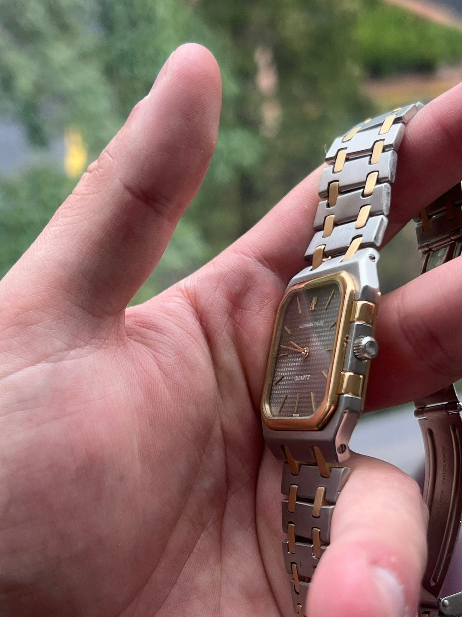 May be an image of digital watch and text