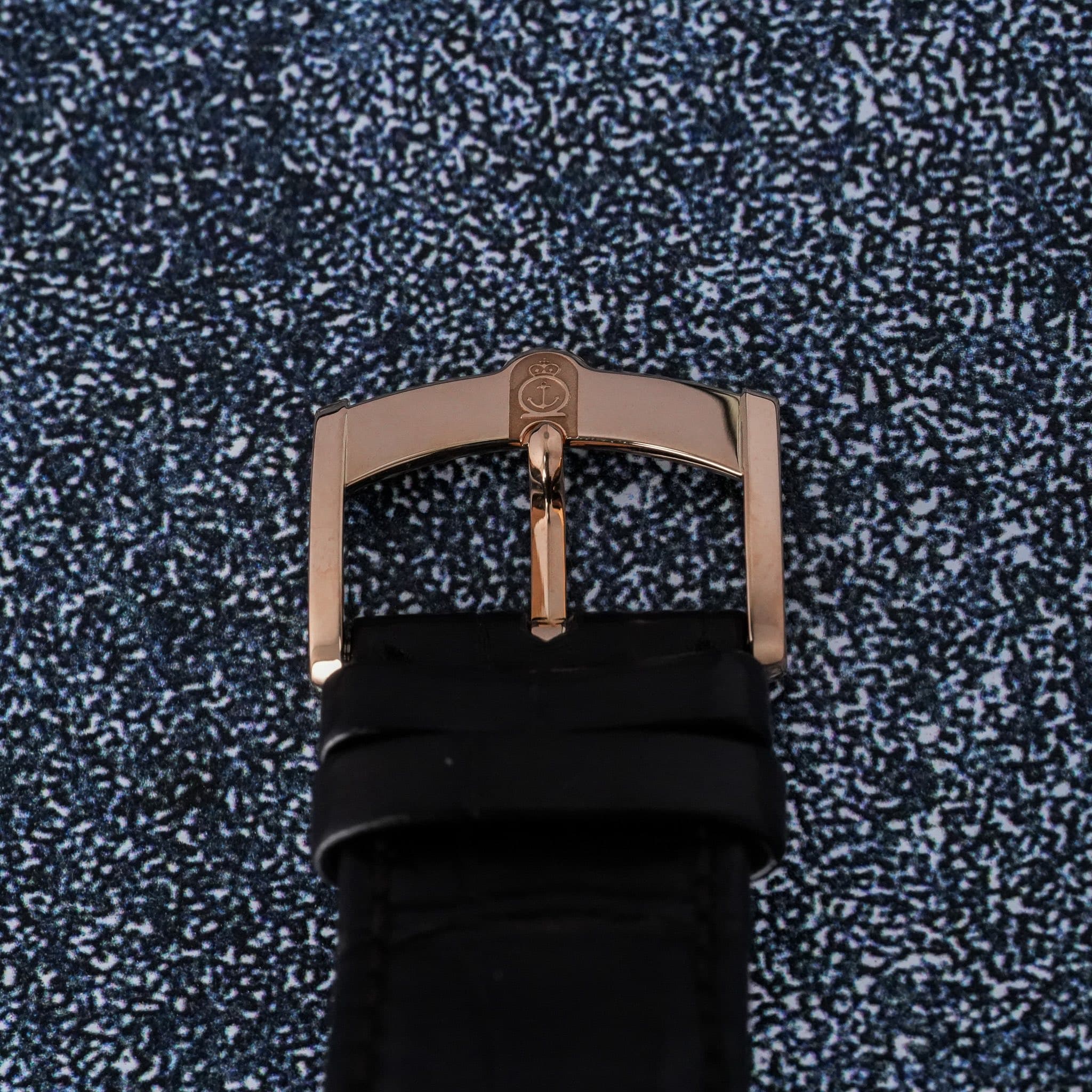 May be an image of leather, saddle-stitched leather and wrist watch