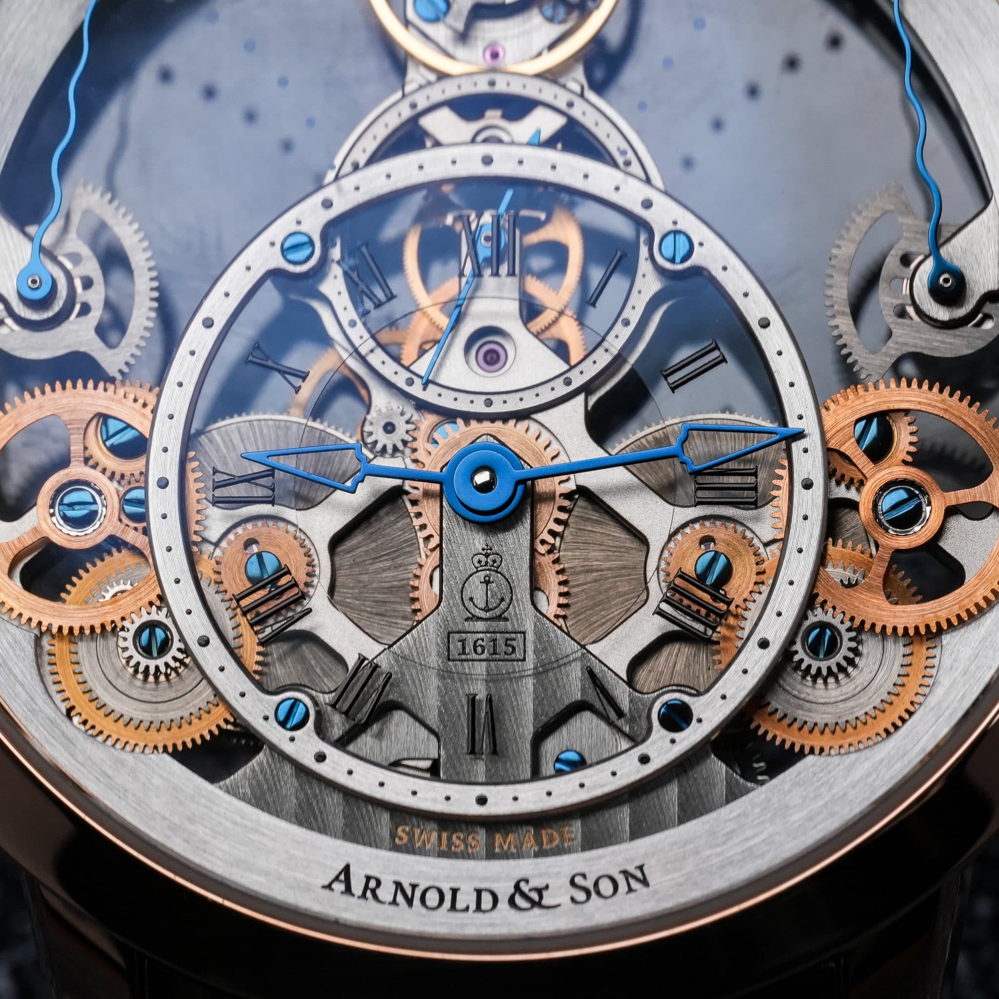 May be an image of wrist watch and text that says '販 จ 0 KA2A mm wou LTS 161 duZ 0 SWISS SWISSMADE MADE ARNOLD ARNOLD&SON & SON'
