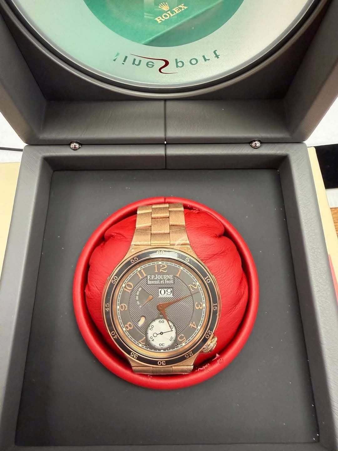 May be an image of wrist watch and text that says 'ROLEX ROLEX EX 1!มต2 RPOLE boLf 3 55 F.P.JOURNE Fecil 50 10 NUIN o 0 40 I دبی DE SP م 22 00'