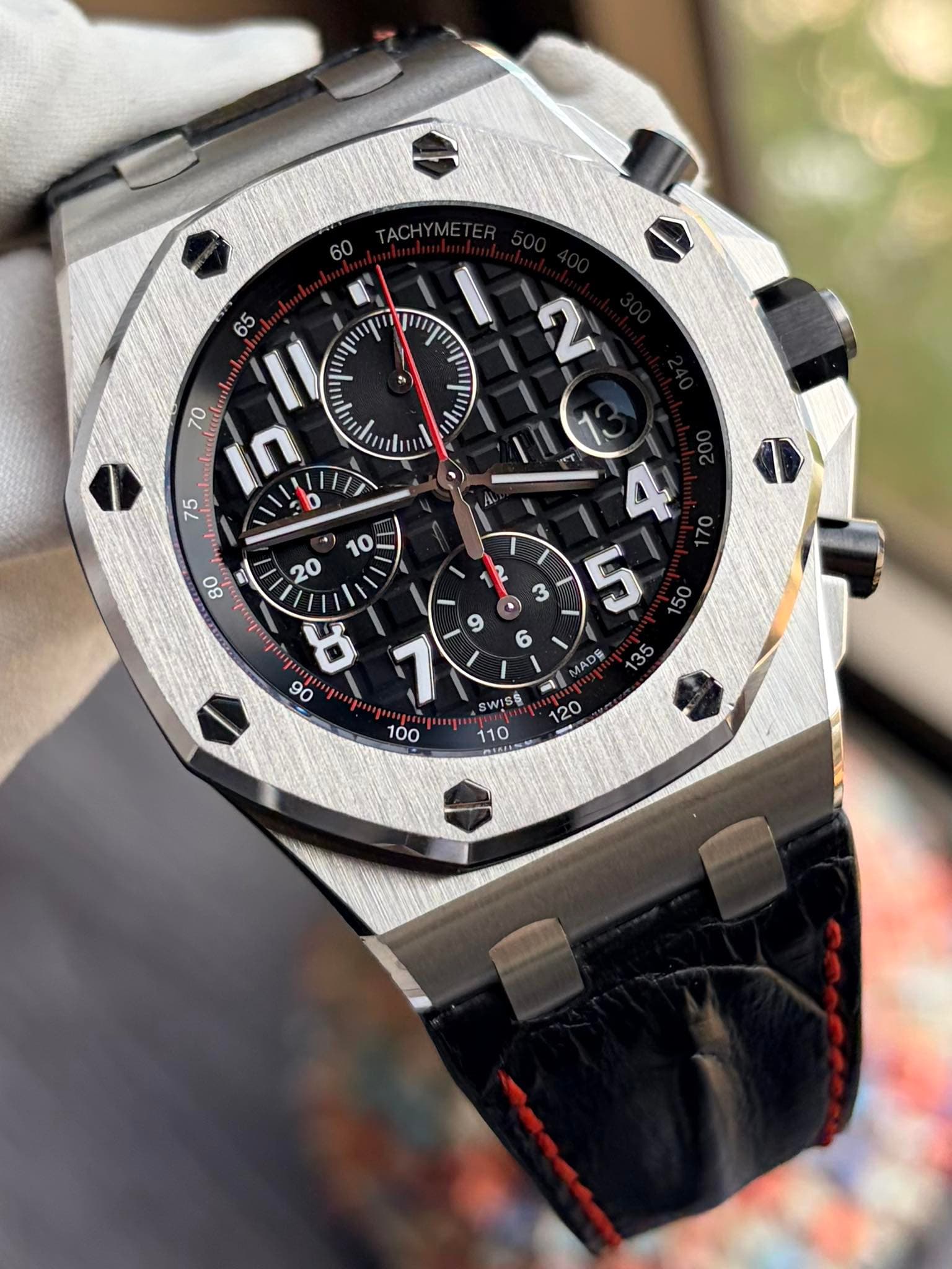May be an image of wrist watch and text that says 'AC 60 65 II I 70 25 75 ^ 1 קגוייע O stuan ٥ه 0/ MADE SWISE 120 110'