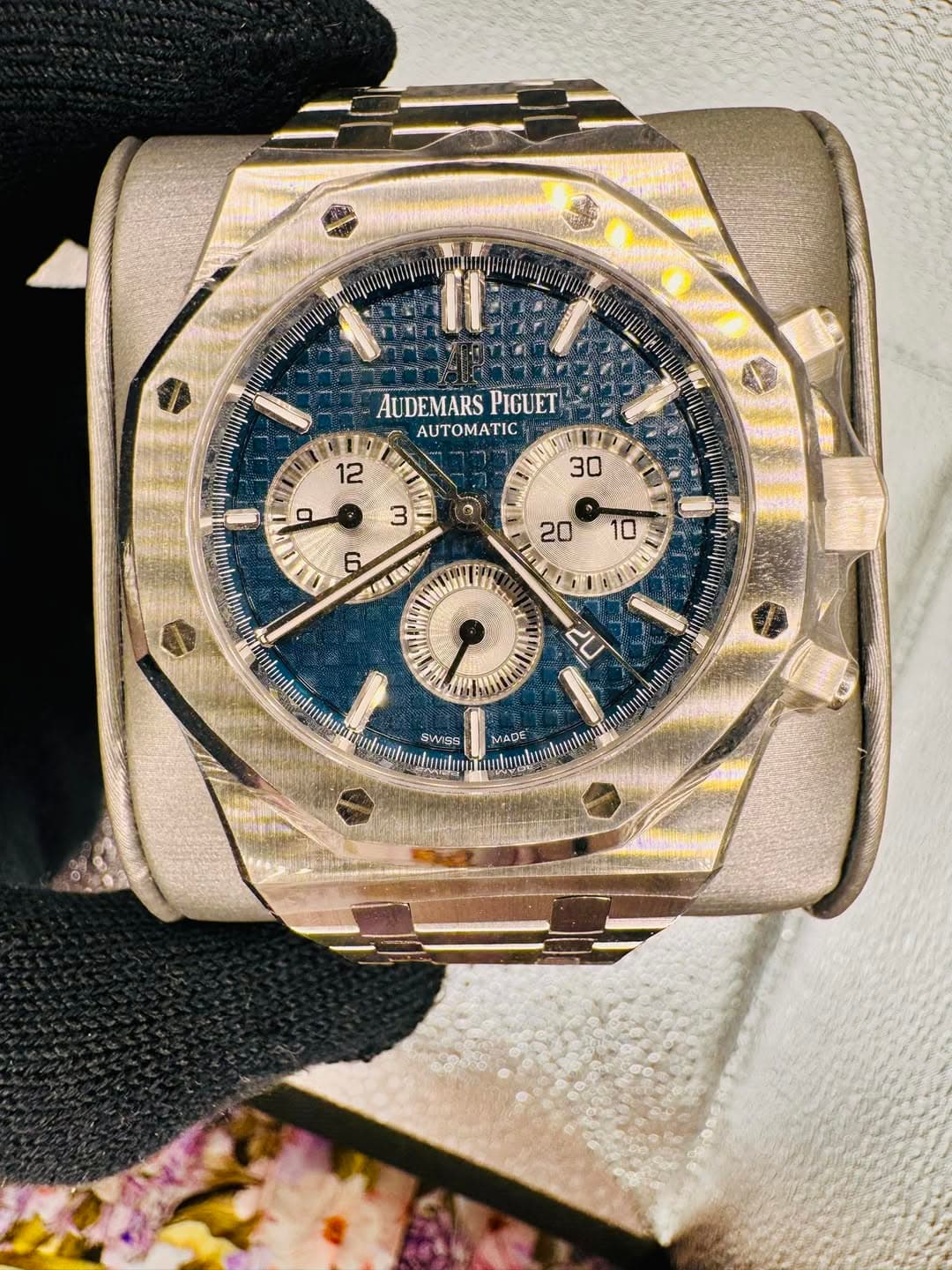 May be an image of wrist watch and text