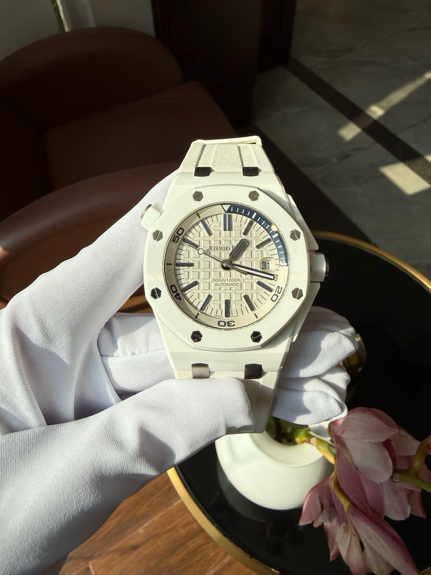 May be an image of wrist watch and text that says 'ייה LDEMARS 31 com/1000n) AЛO C 20 οε 市'