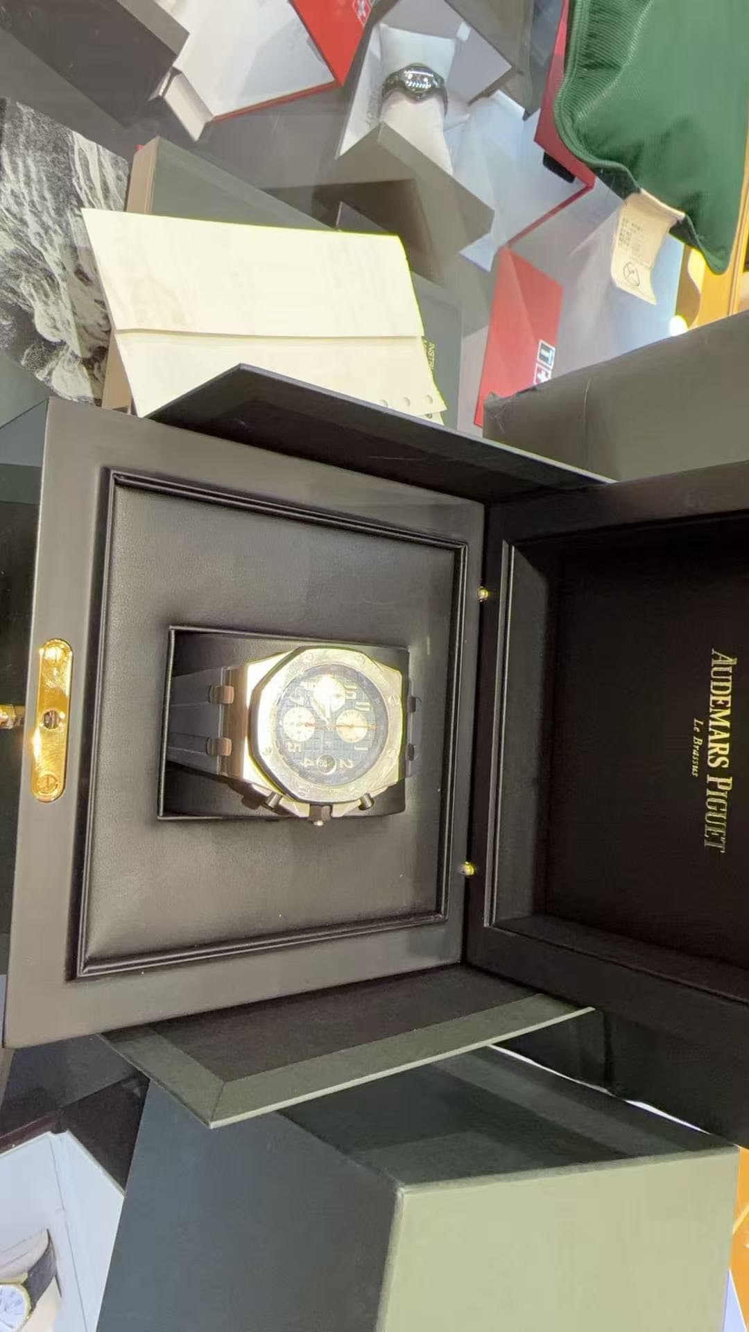 May be an image of wrist watch and text