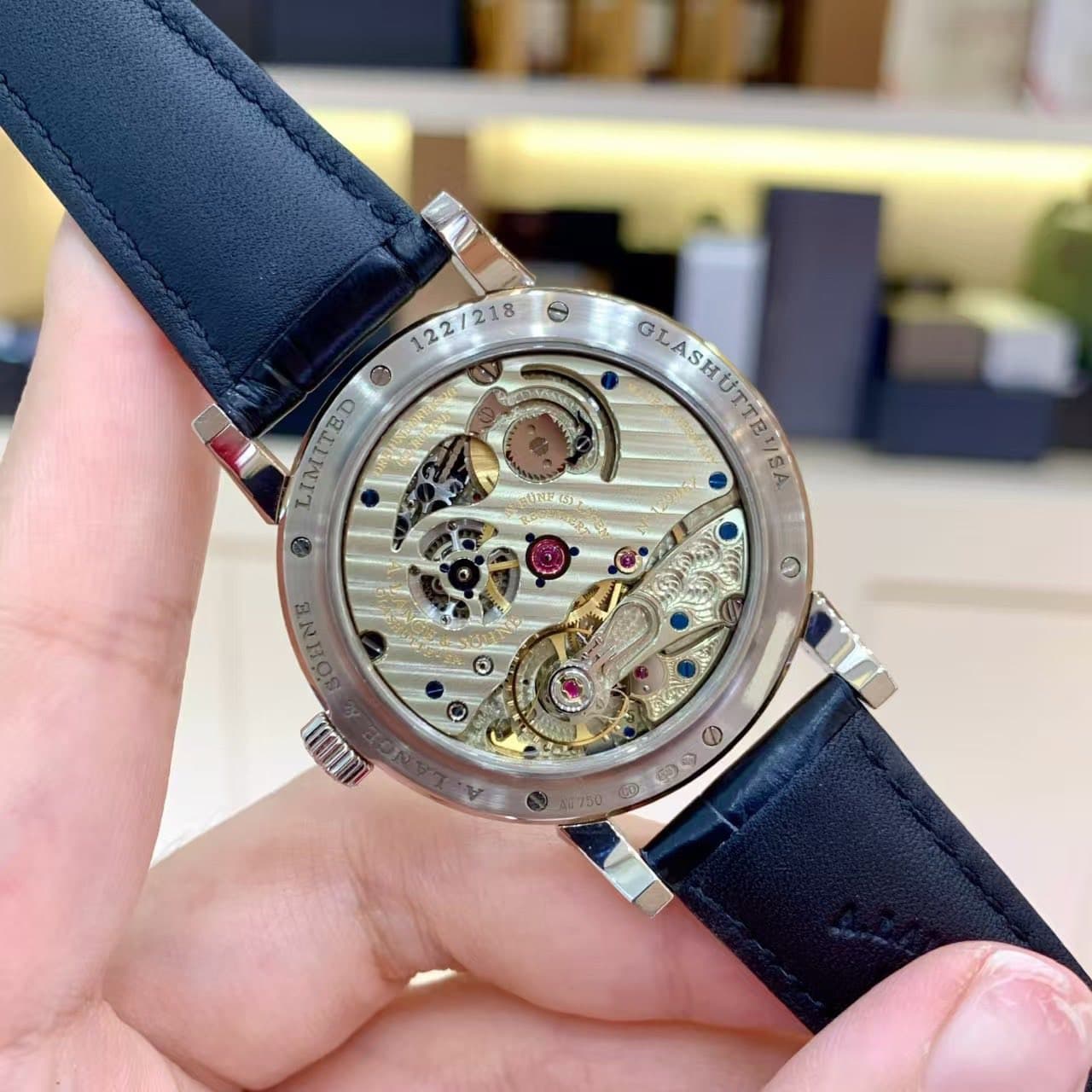 May be an image of wrist watch and text