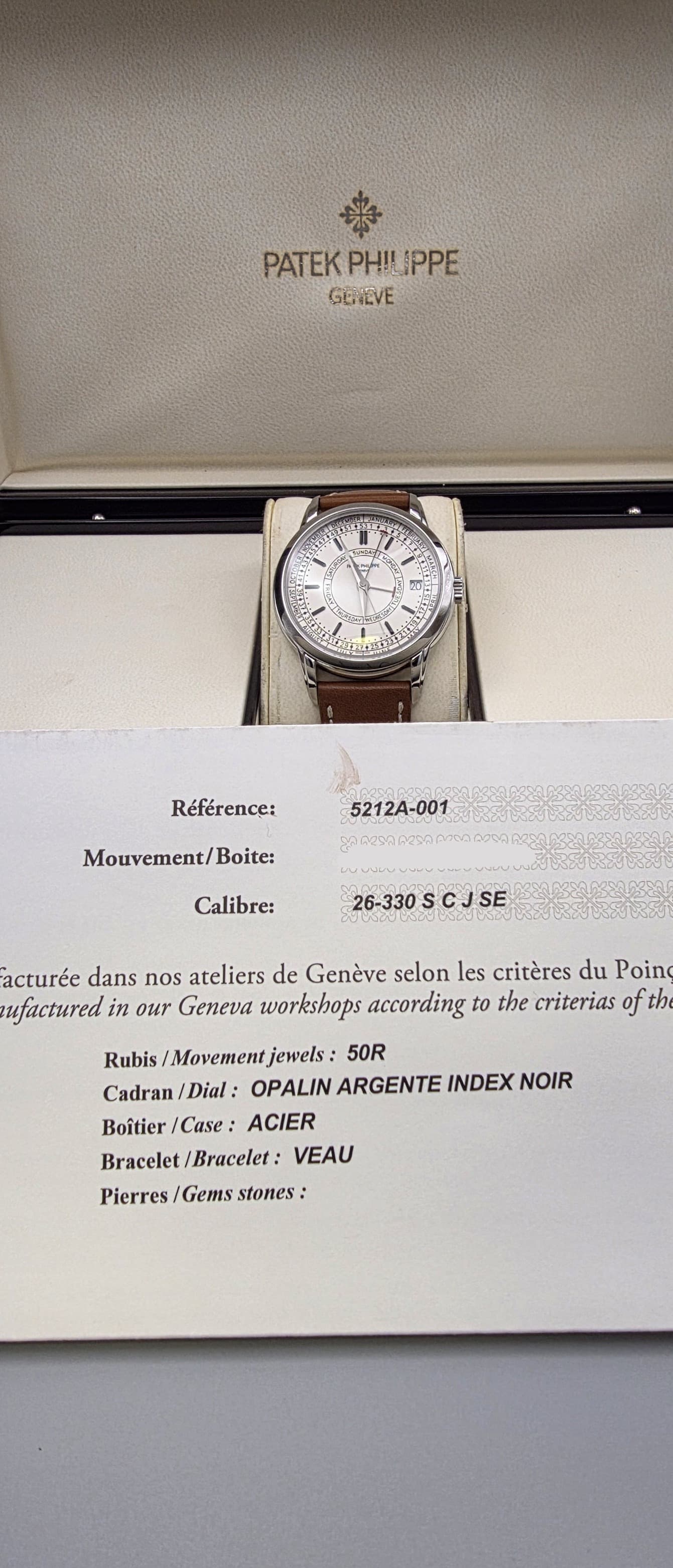May be an image of wrist watch and text that says 'PATEKPH!UPPE PH!L IPPE PATEK GENLVE 1+ ้ว កវិត្ R Référence: ence: 5212A-001 Mouvement/Boite: +209E22205 Calibre: 26-330SCJSE…