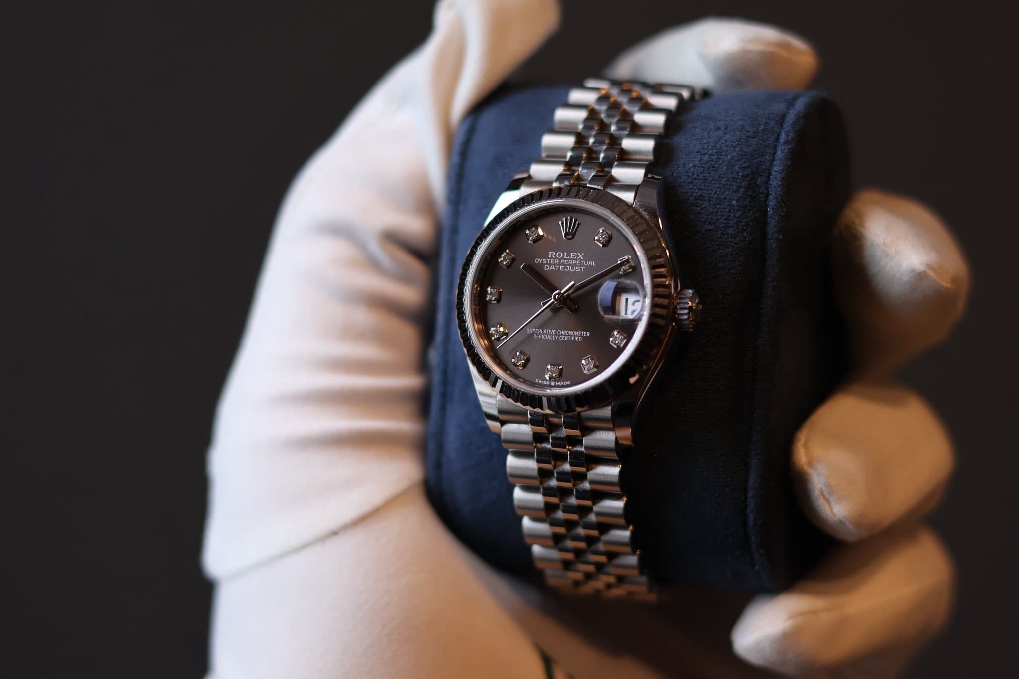May be an image of wrist watch and text