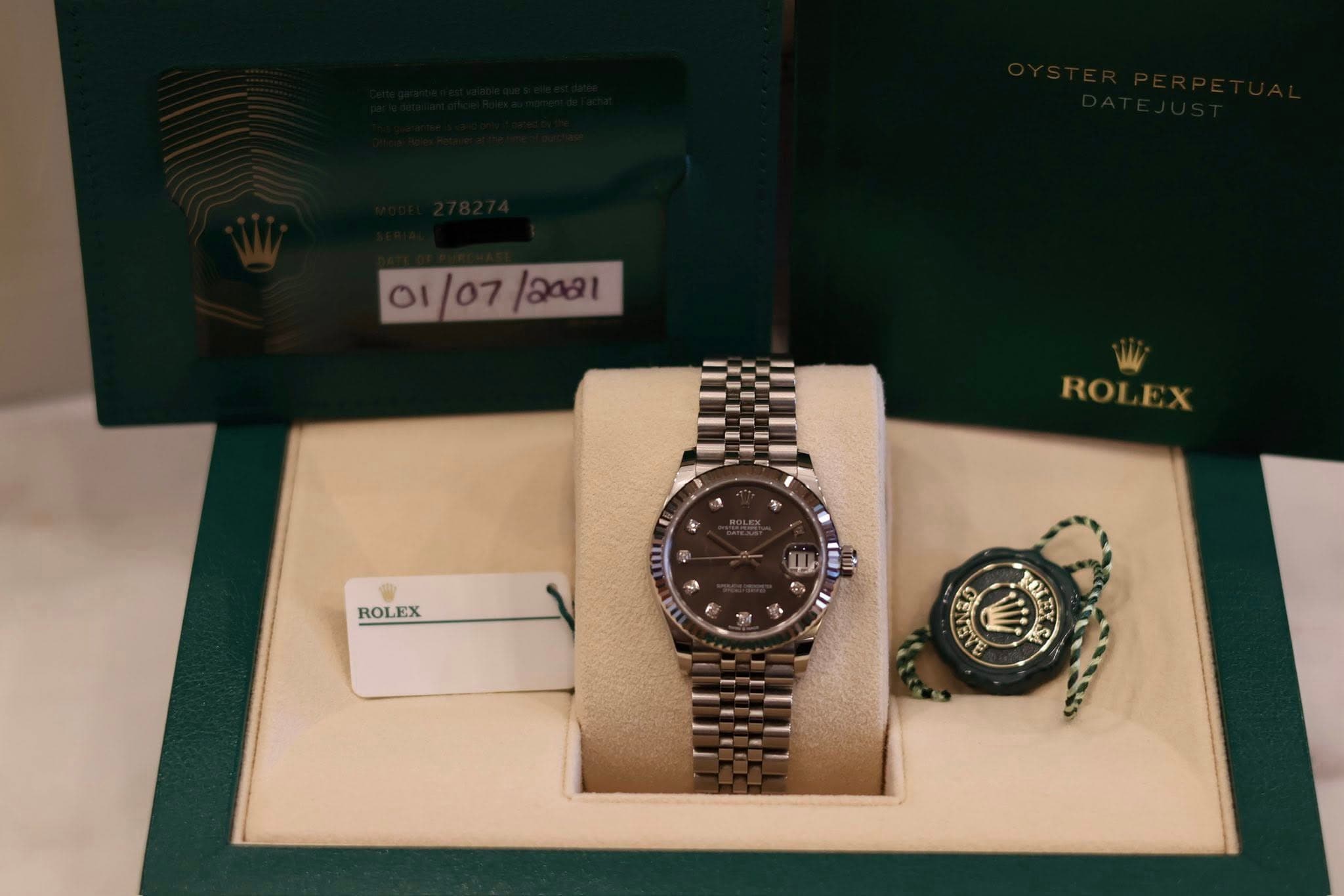 May be an image of wrist watch and text that says '01/07/2481 ROLEX ROLEX OSIS ርን ISX ותן'