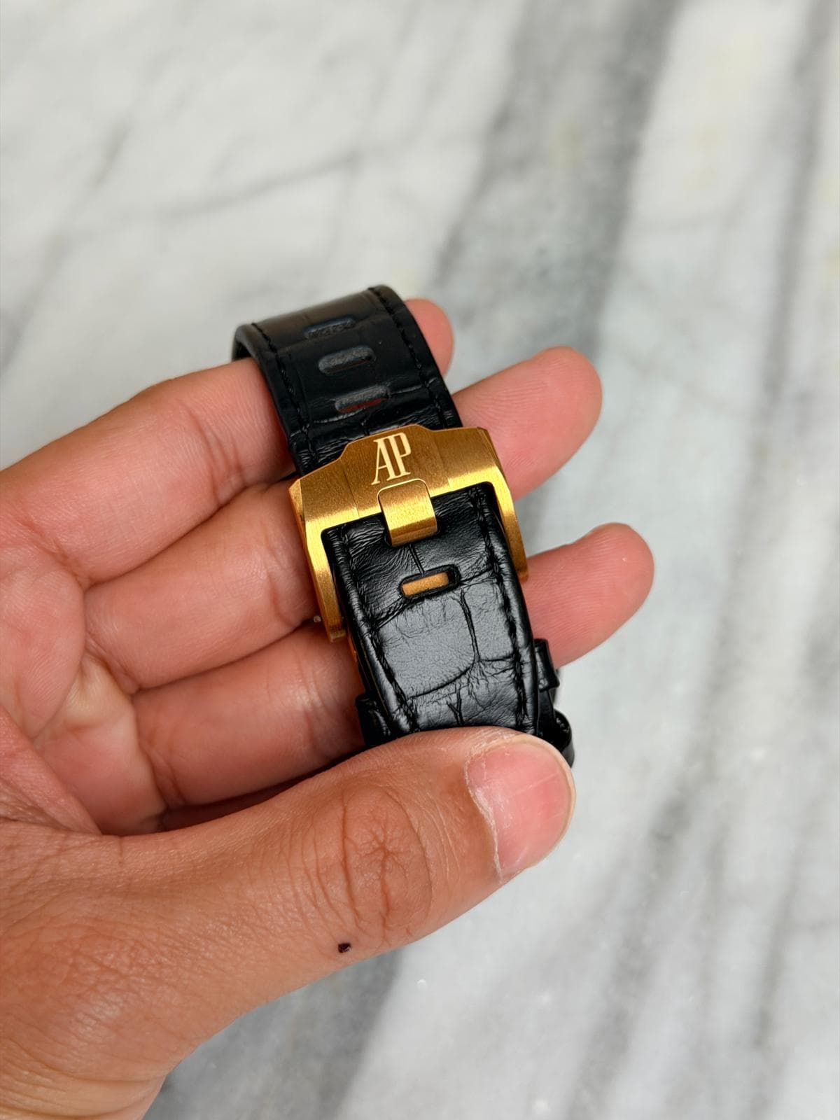 May be an image of digital watch and text that says 'AP'