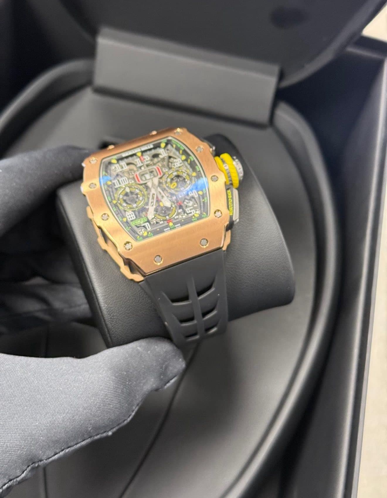 May be an image of wrist watch and text