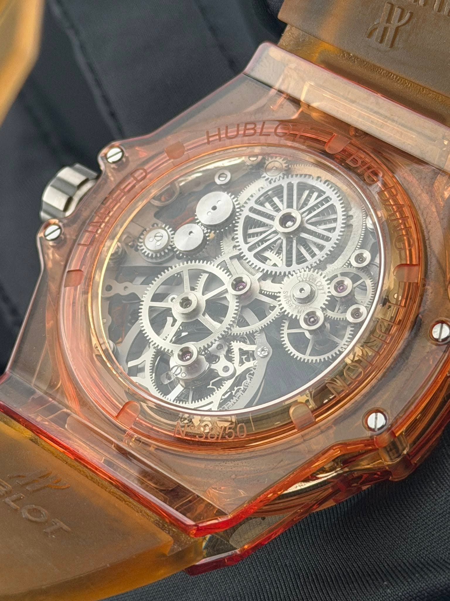 May be an image of wrist watch and text